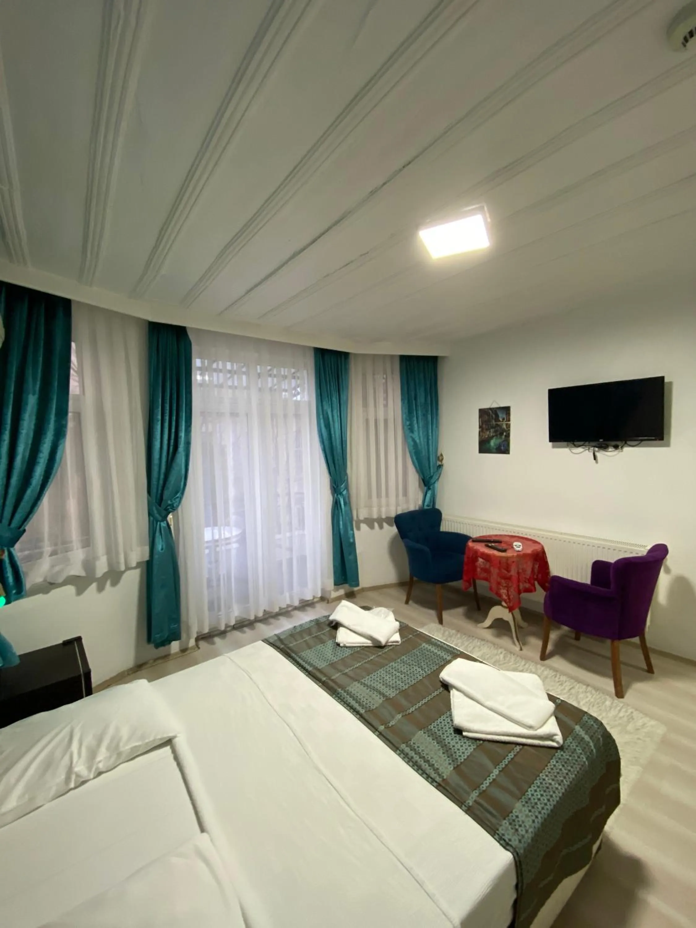 Photo of the whole room, Bed in Masal Hotel