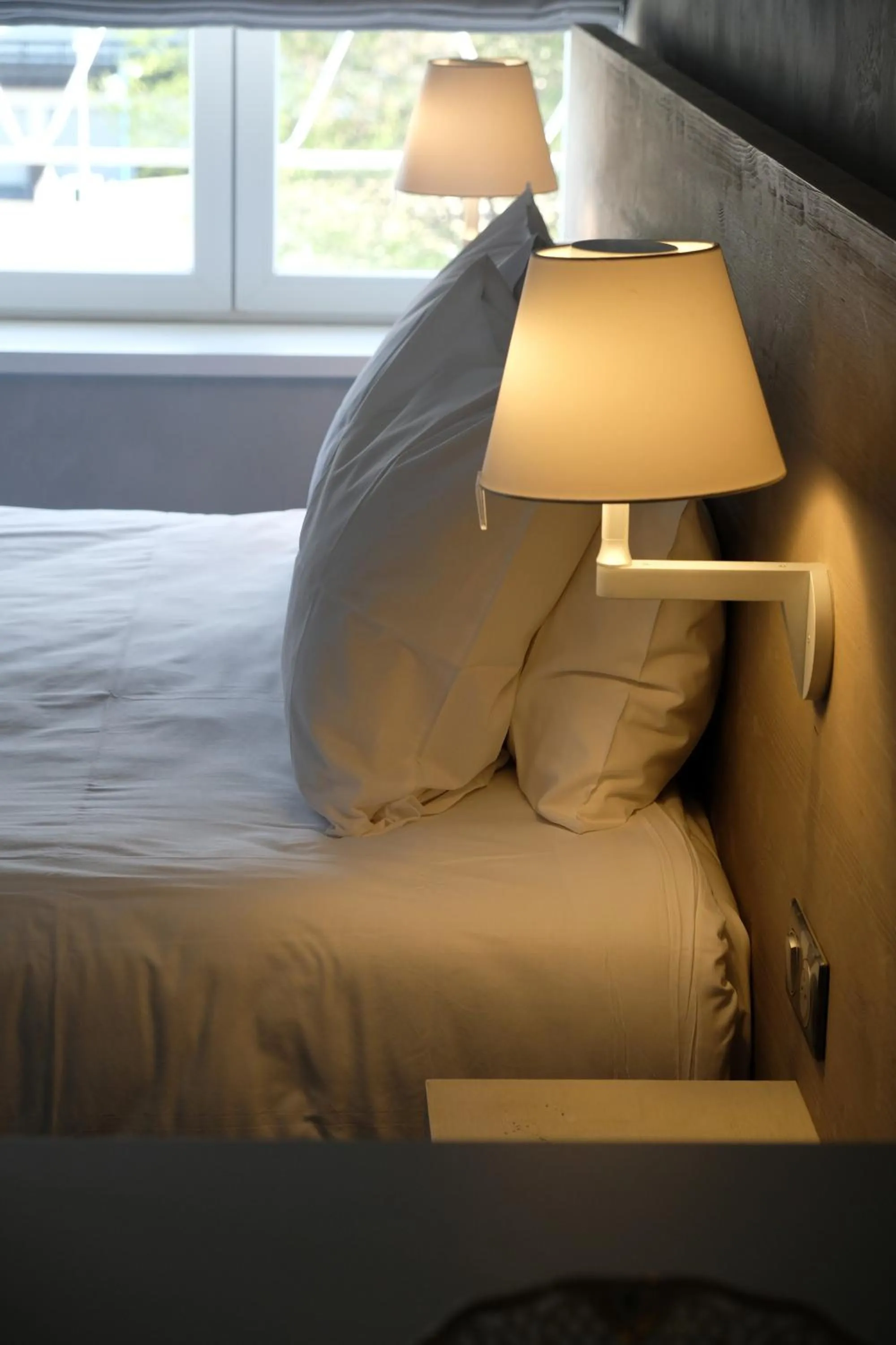 Bed in Maison Jenny Hotel Restaurant & Spa