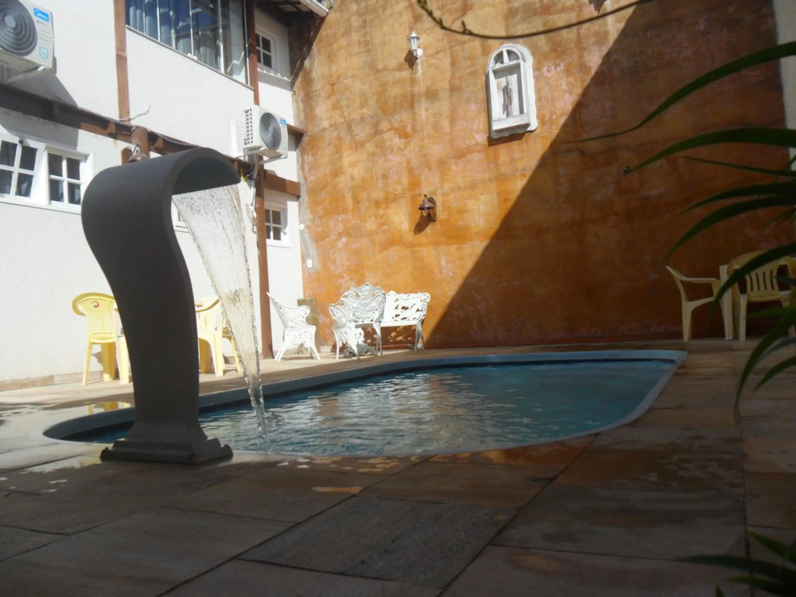 Swimming pool in Pousada La Lampara