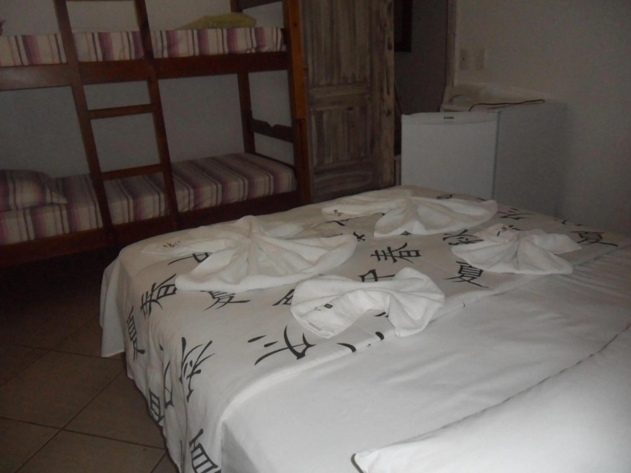Bed in Pousada La Lampara