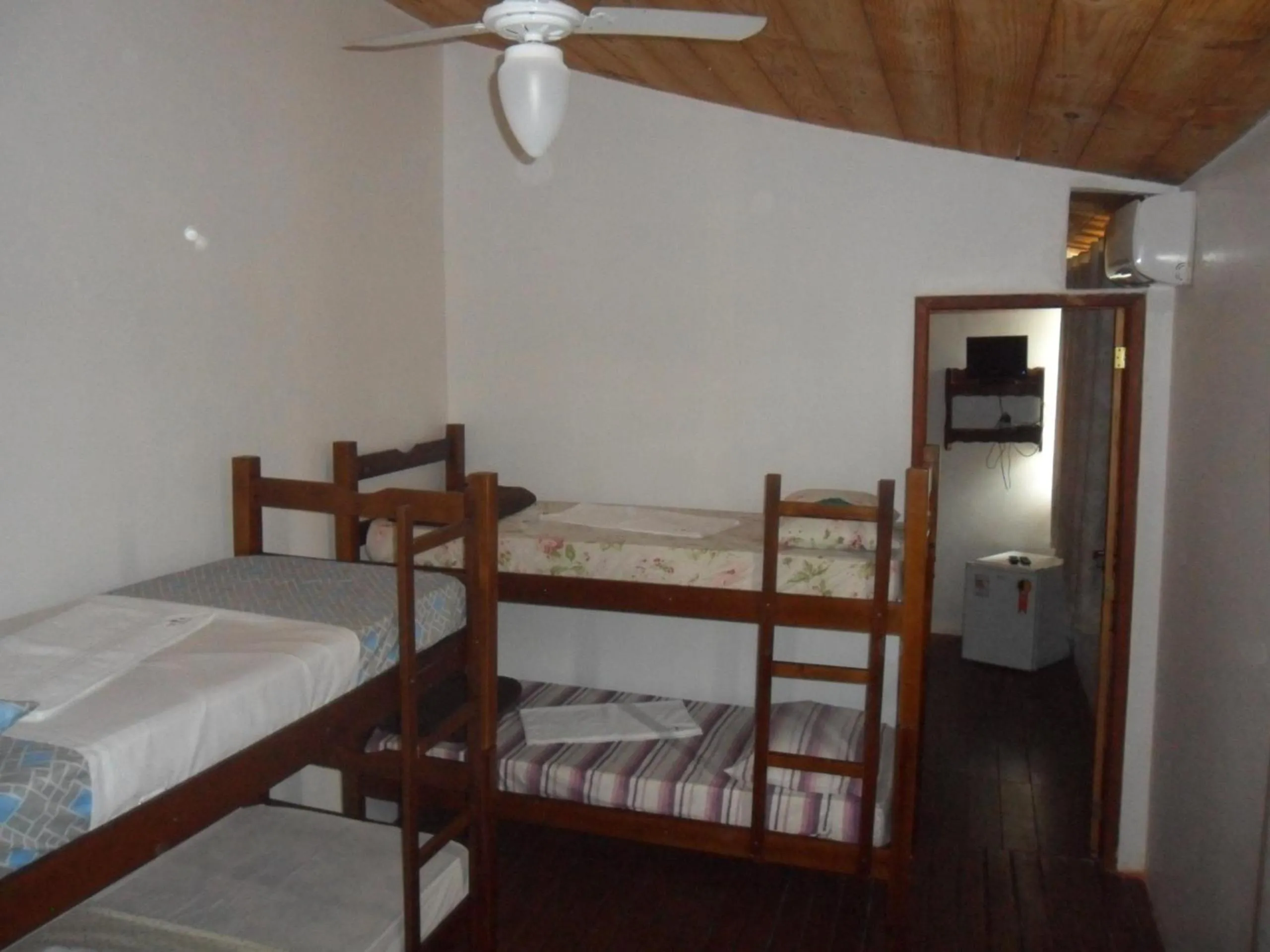 Bed in Pousada La Lampara