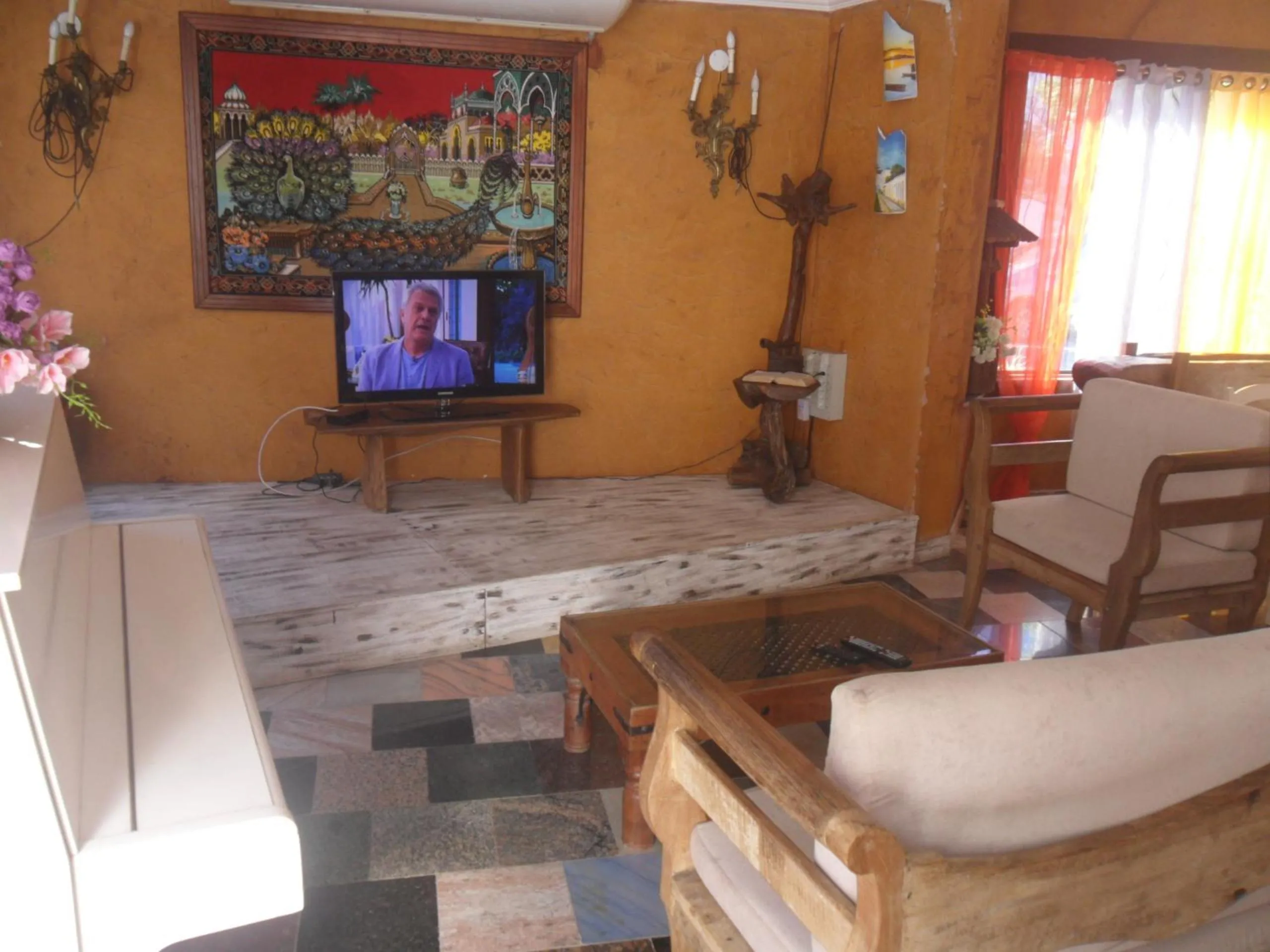 Communal lounge/ TV room in Pousada La Lampara