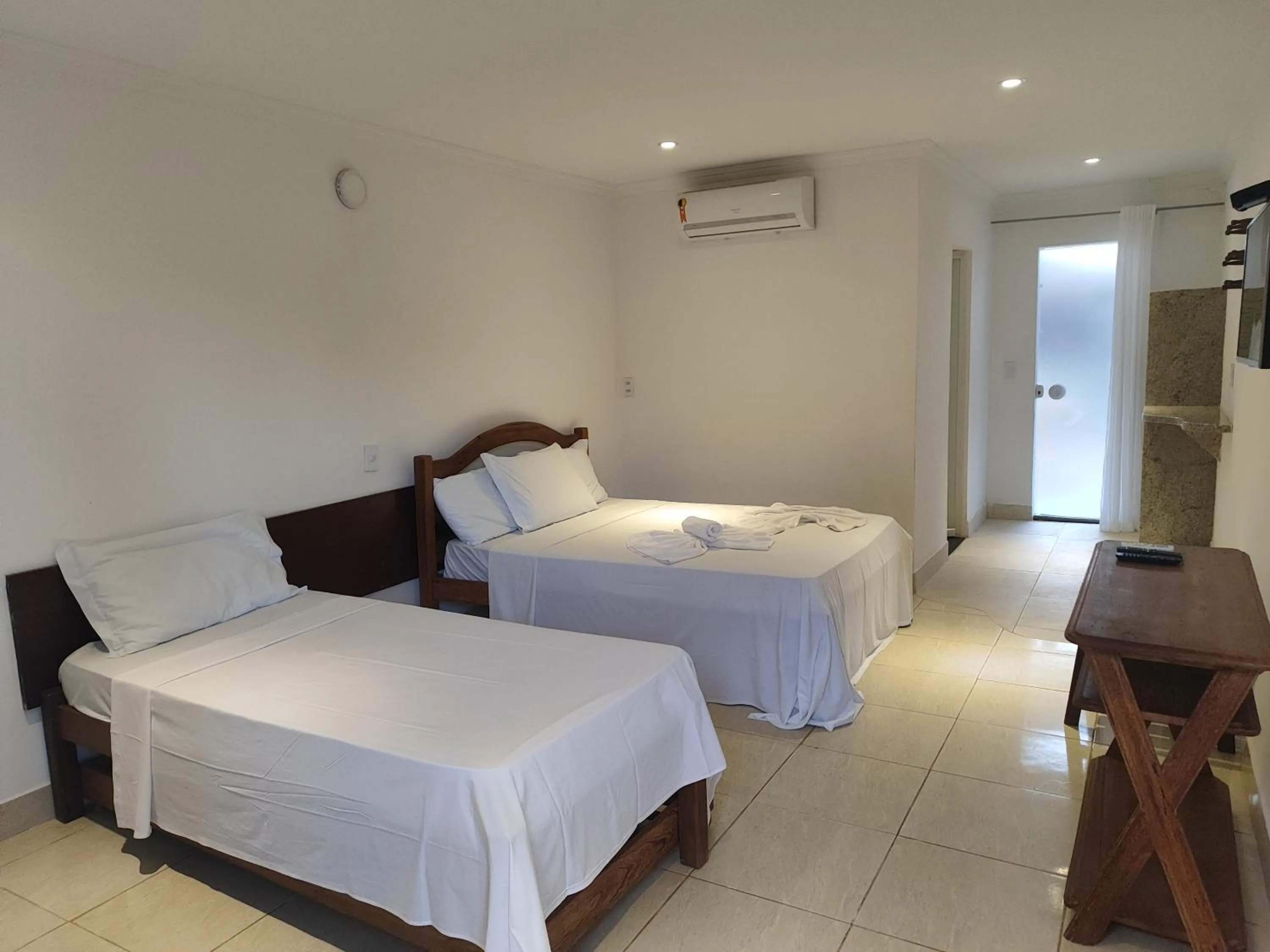 Bed in Pousada Água de Fuego