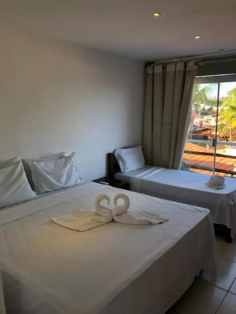 Bed in Pousada Água de Fuego