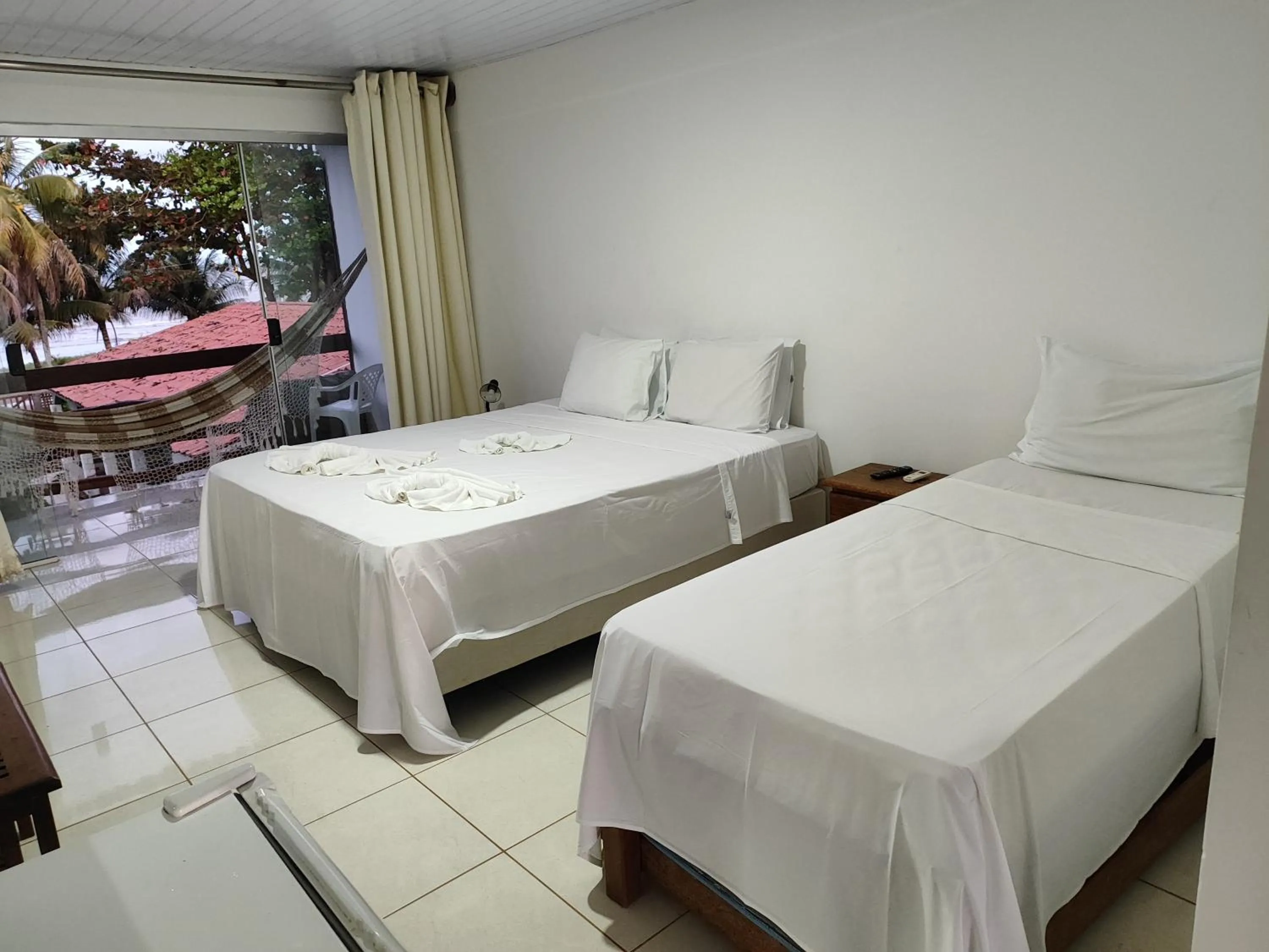 Bed in Pousada Água de Fuego