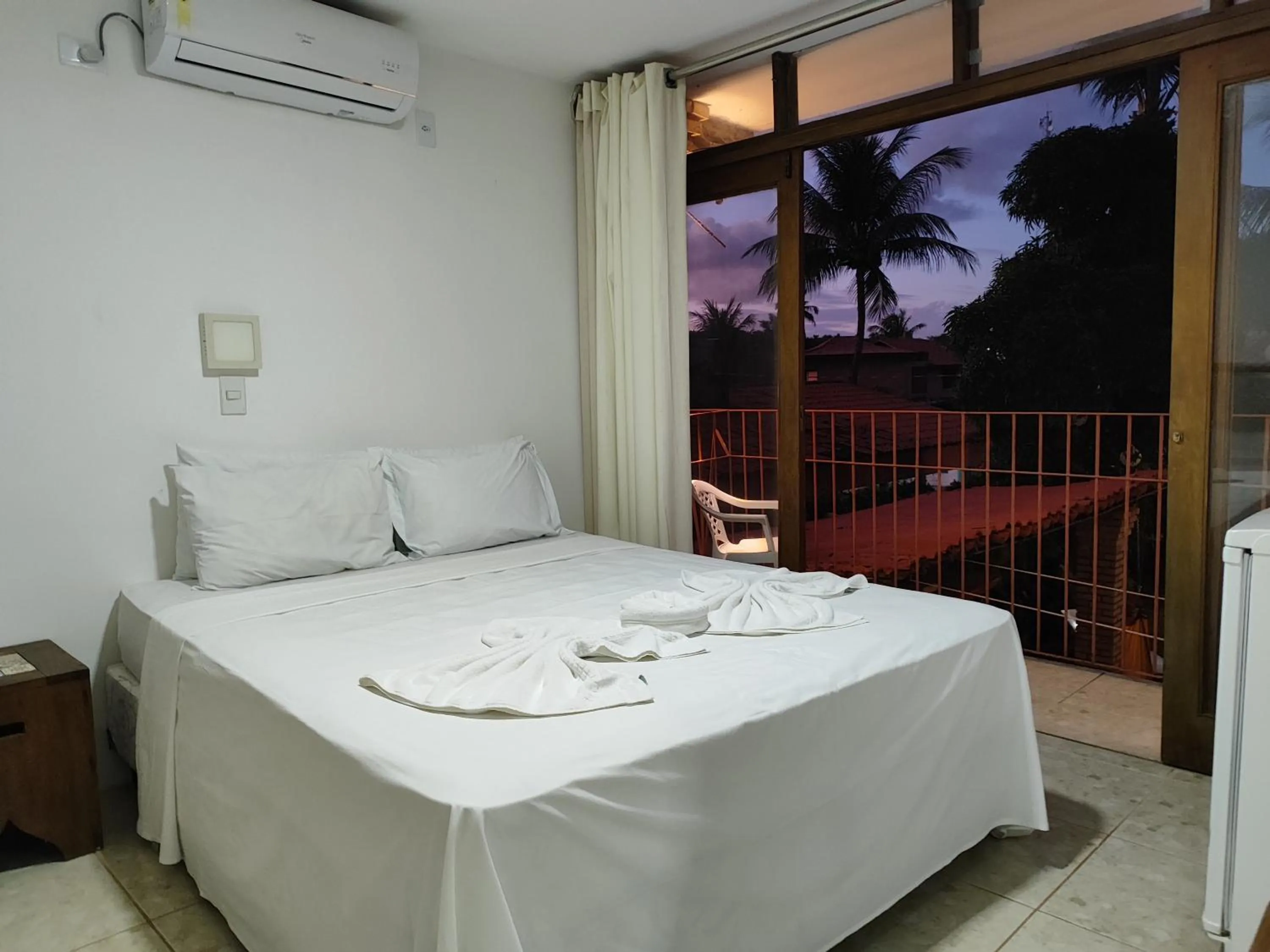 Bed in Pousada Água de Fuego