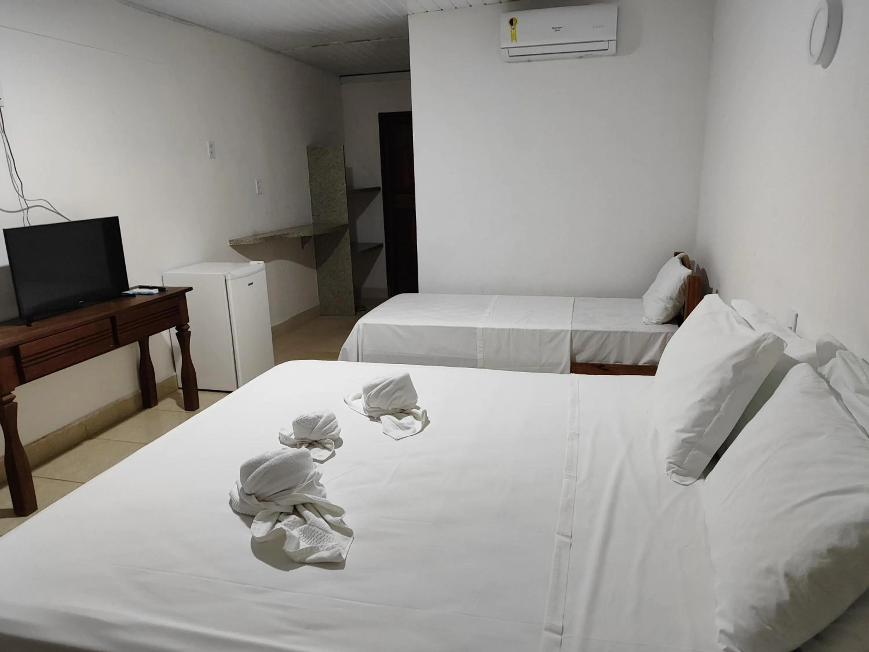 Bed in Pousada Água de Fuego