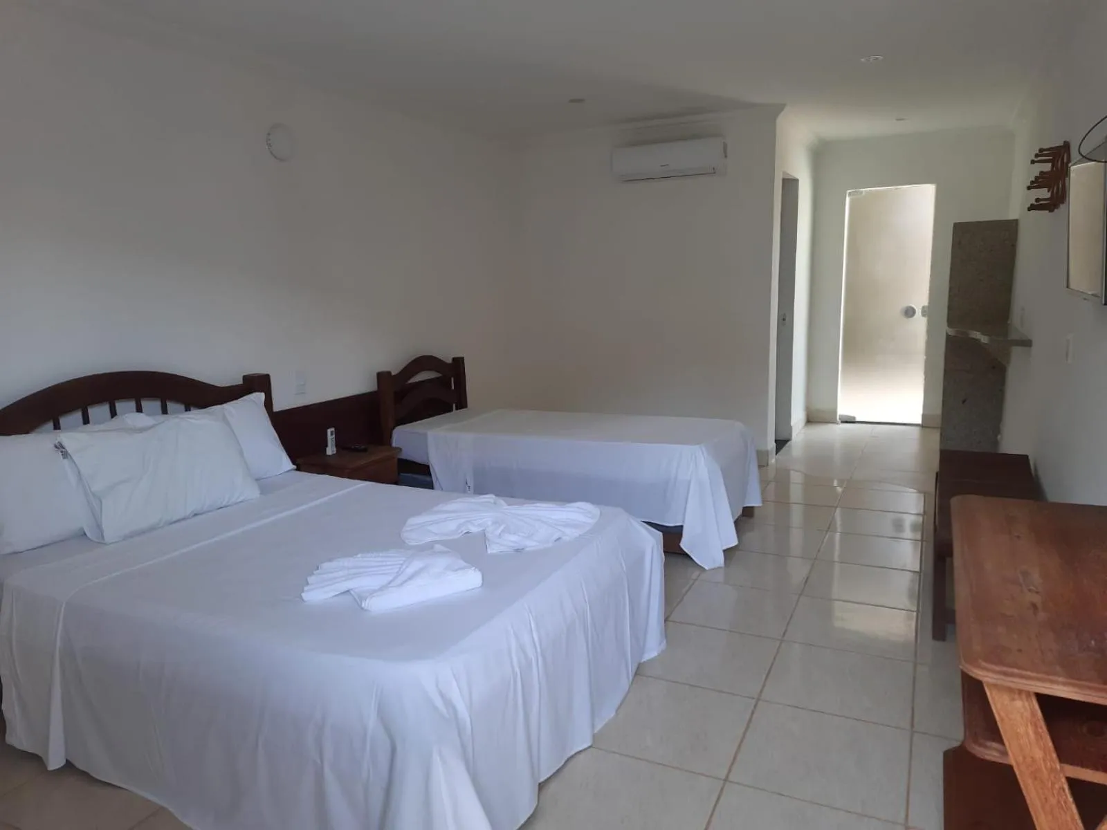 Property building, Bed in Pousada Água de Fuego