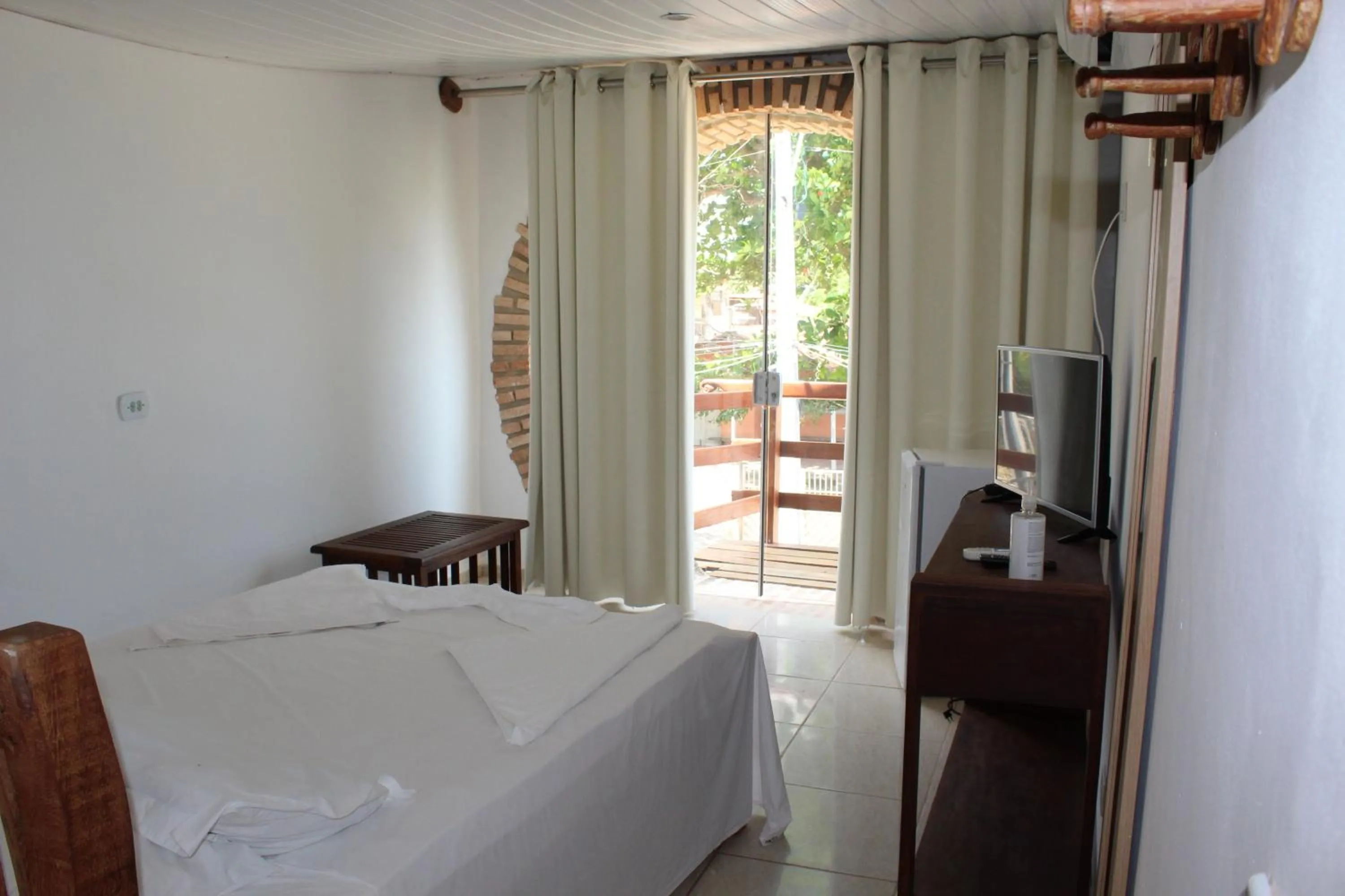 Photo of the whole room, Bed in Pousada Água de Fuego