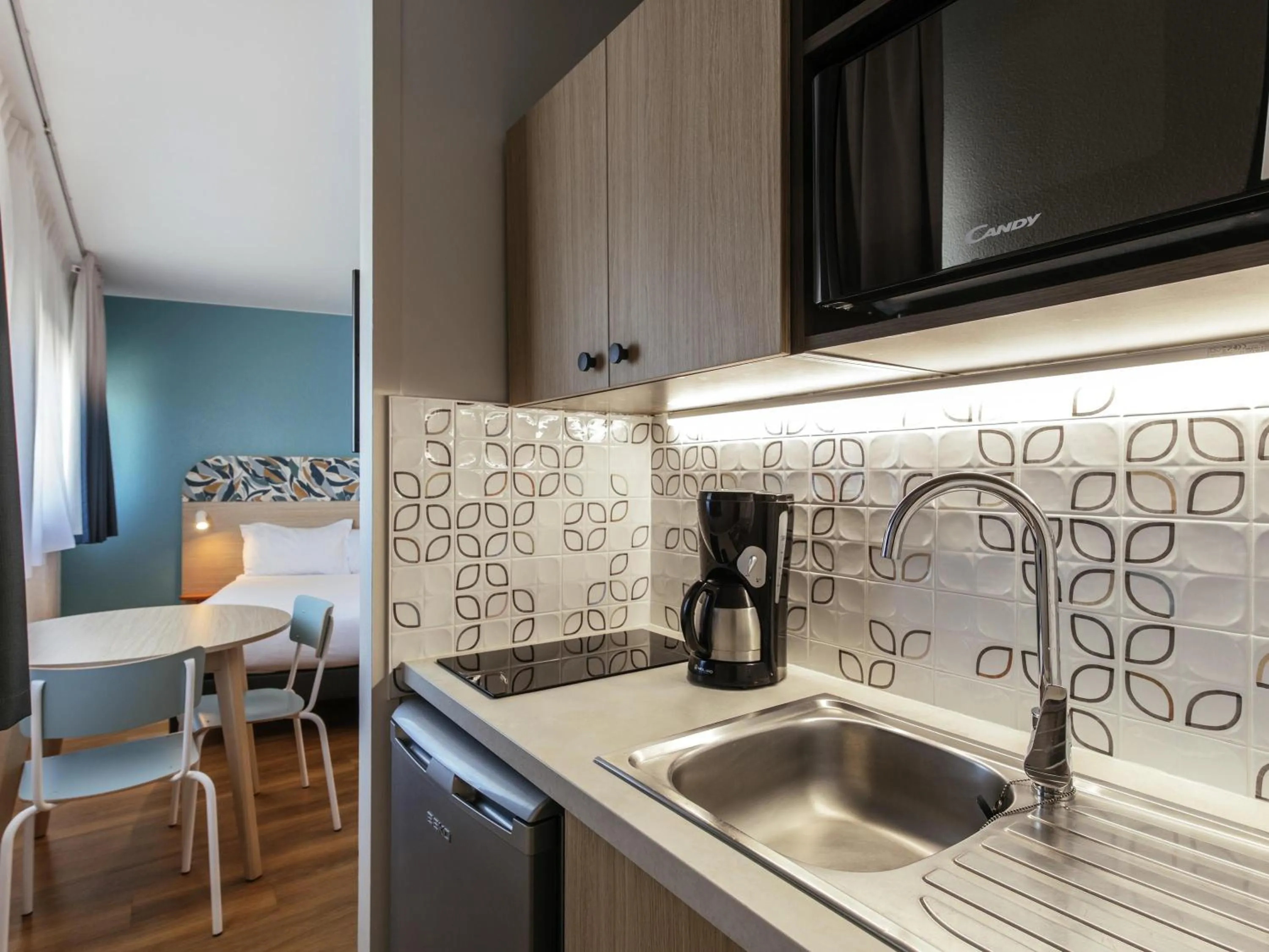 Bedroom in Aparthotel Adagio Access Paris La Villette