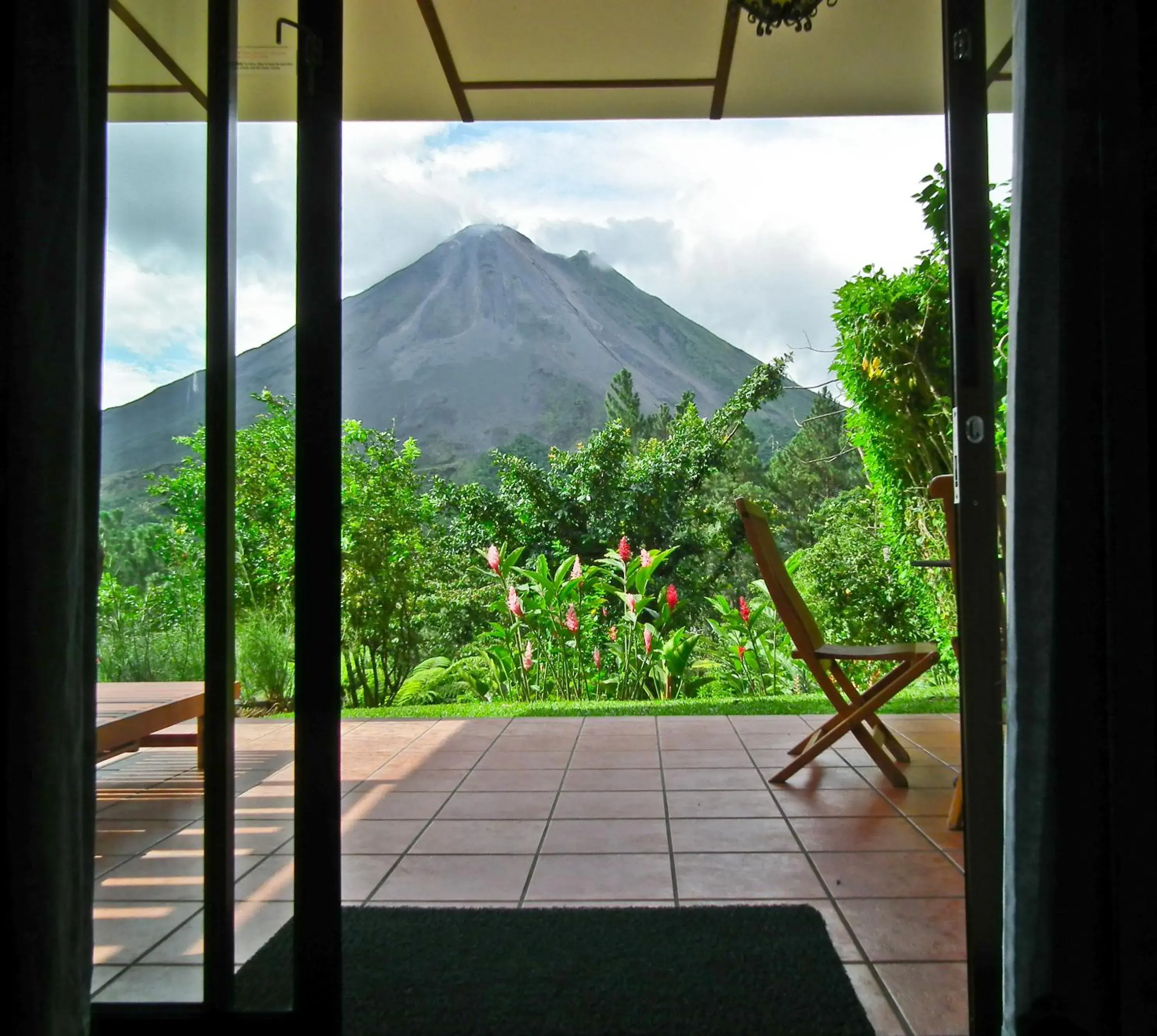 Smithsonian Room + Waterfall in Arenal Observatory Lodge & Trails Smithsonian Room + Waterfall in Arenal Observatory Lodge & Trails
