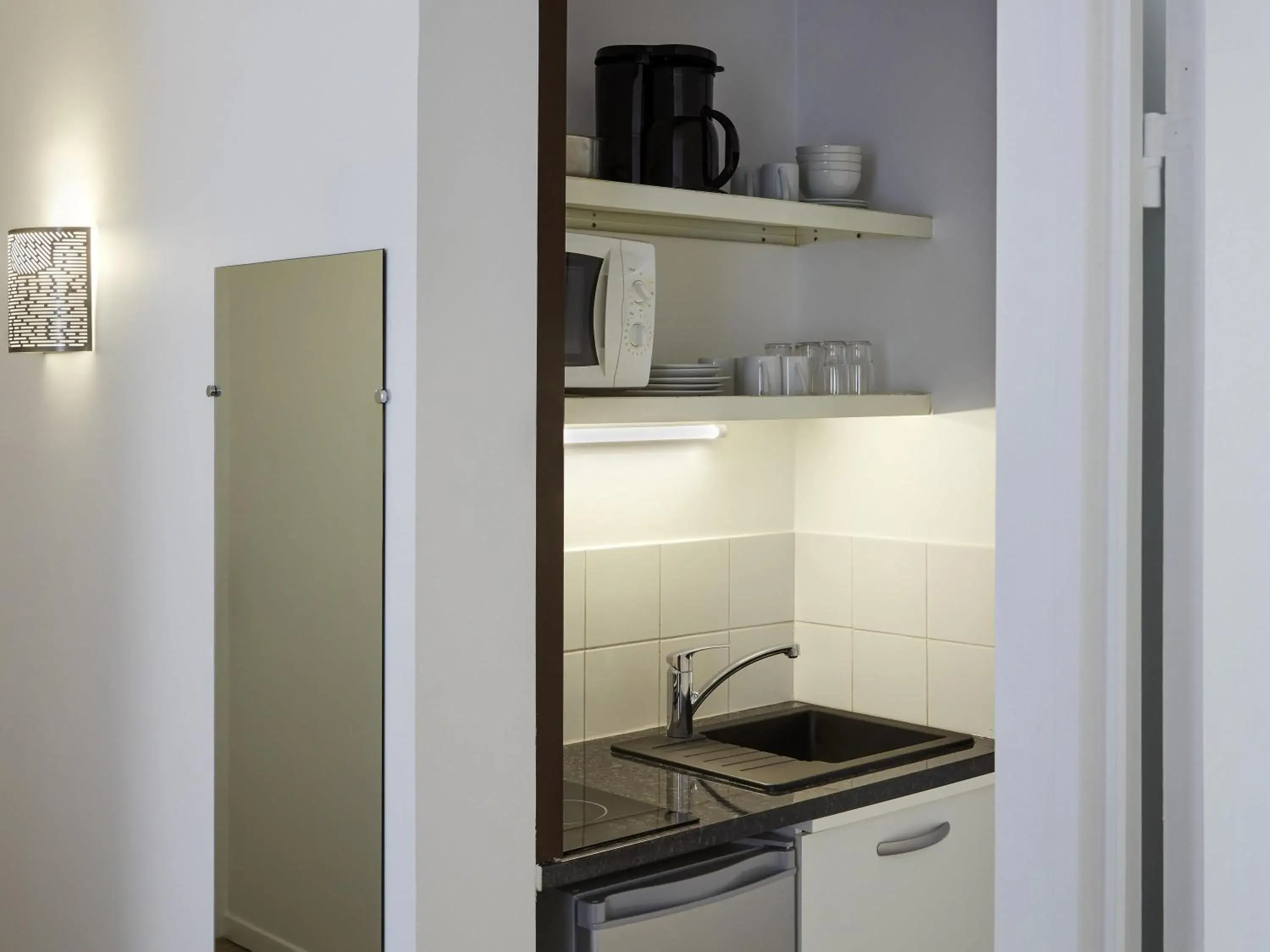 Bedroom in Aparthotel Adagio Access Paris Philippe Auguste Bedroom in Aparthotel Adagio Access Paris Philippe Auguste