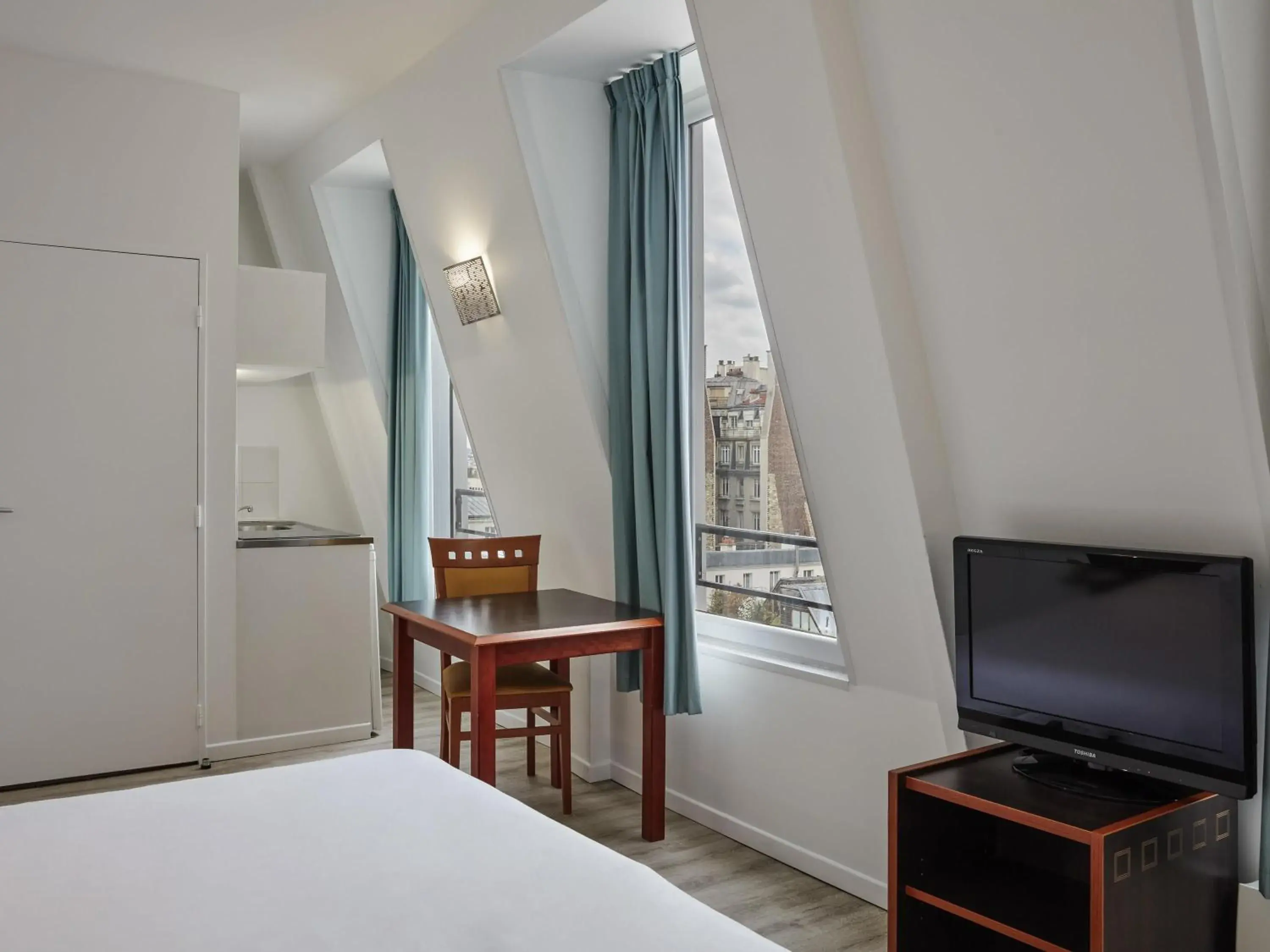 Bedroom, Bed in Aparthotel Adagio Access Paris Philippe Auguste Bedroom, Bed in Aparthotel Adagio Access Paris Philippe Auguste