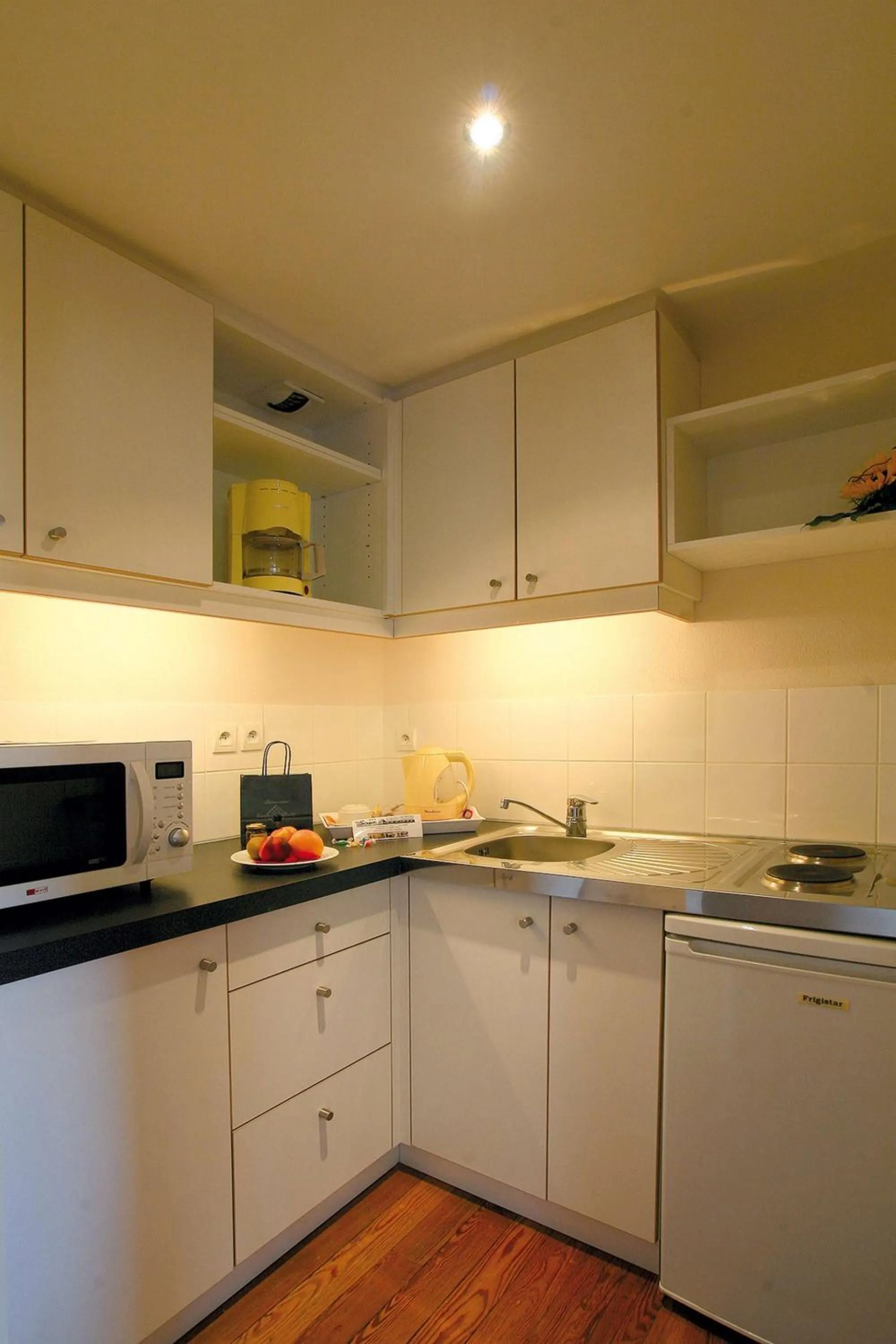 Kitchen or kitchenette in HOTEL CERISE - LES SOURCES Luxeuil-les-Bains