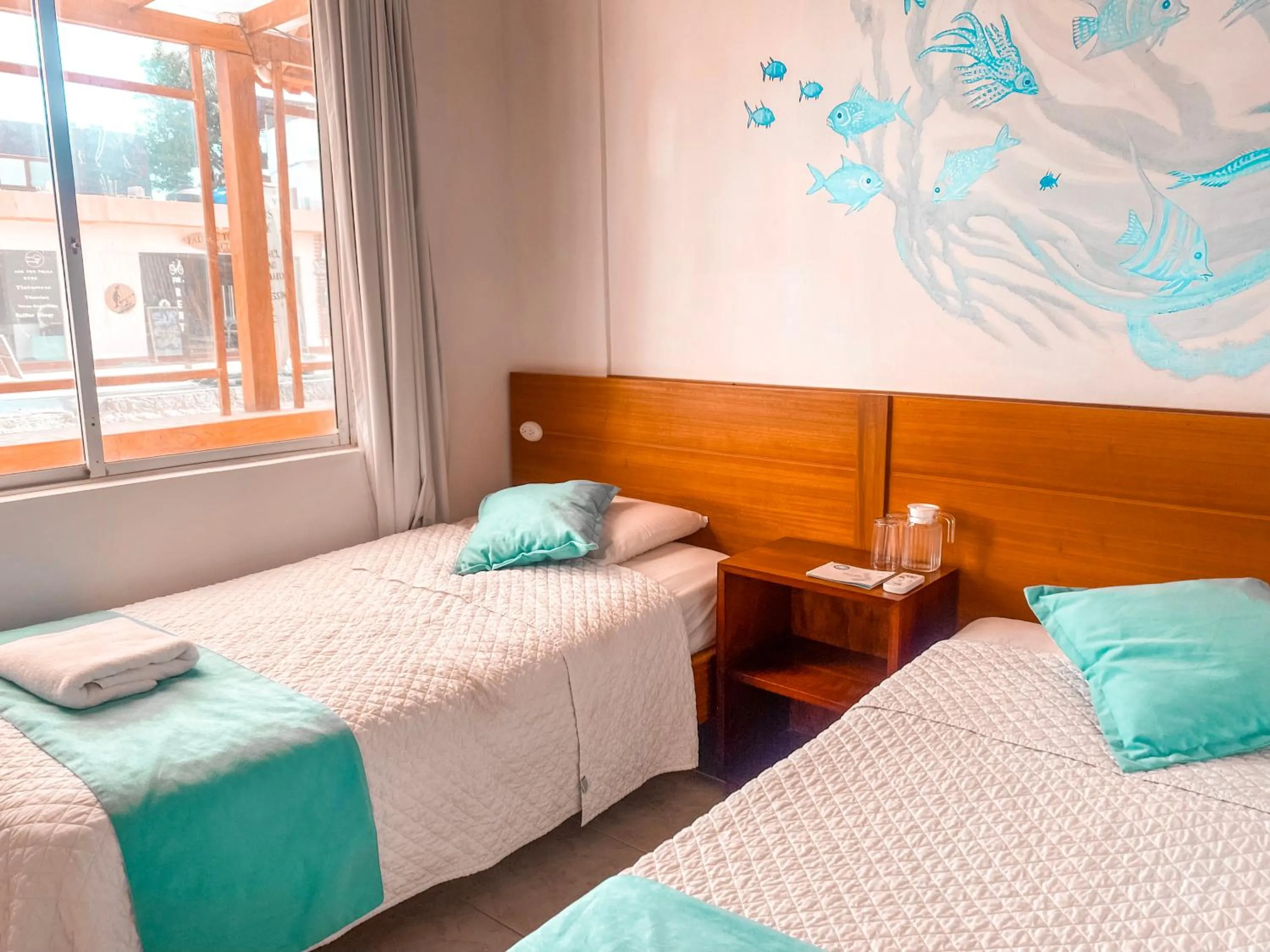 Bed in Hotel Coral Blanco with high speed internet Starlink and Galapagos Tour Operator
