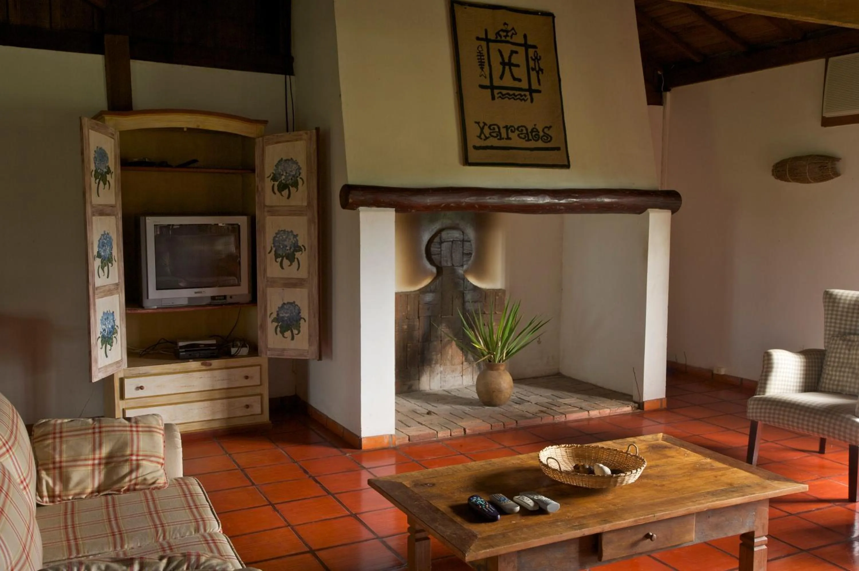 Communal lounge/ TV room in Pousada Fazenda Xaraés