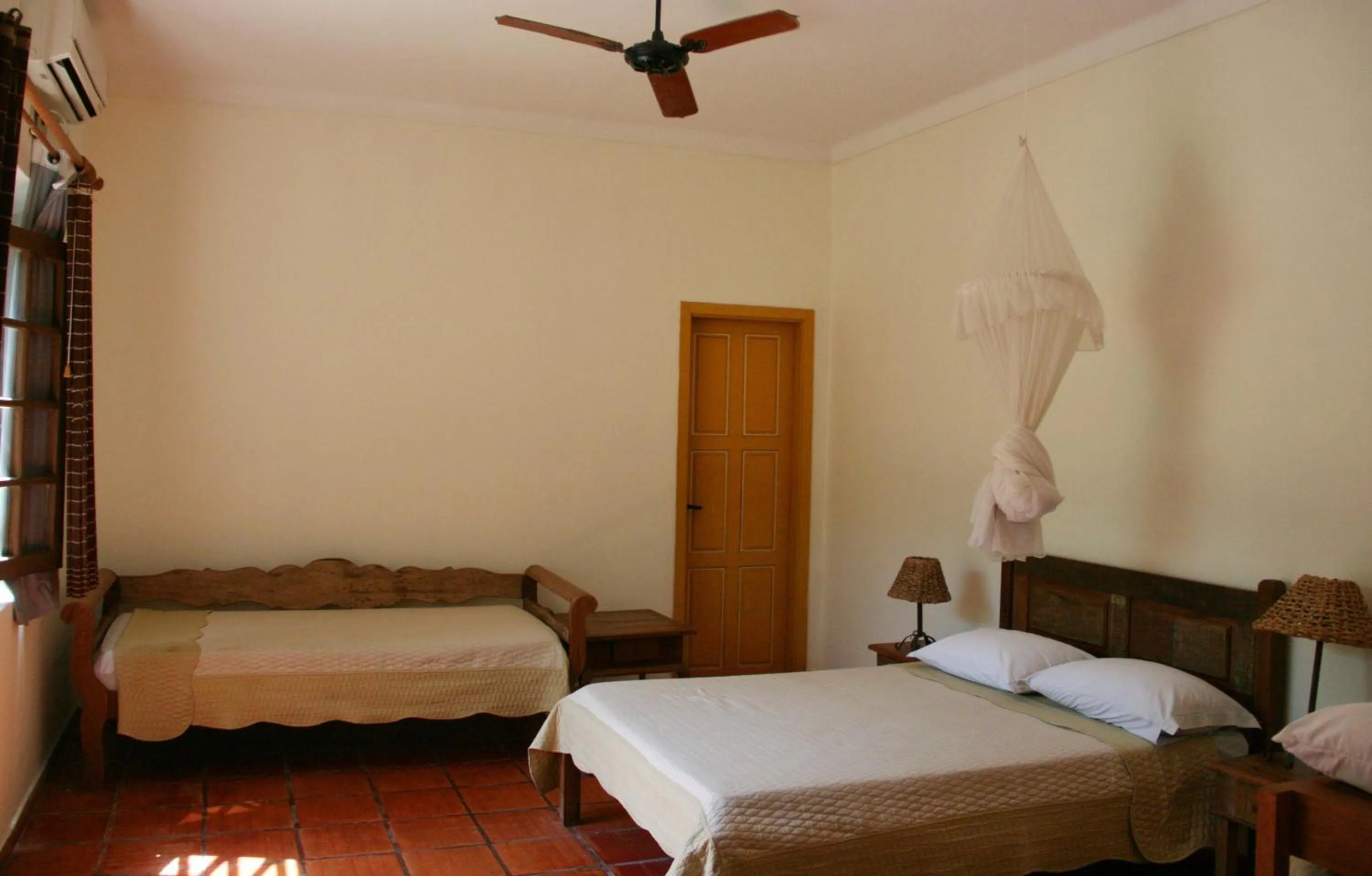 Photo of the whole room, Bed in Pousada Fazenda Xaraés