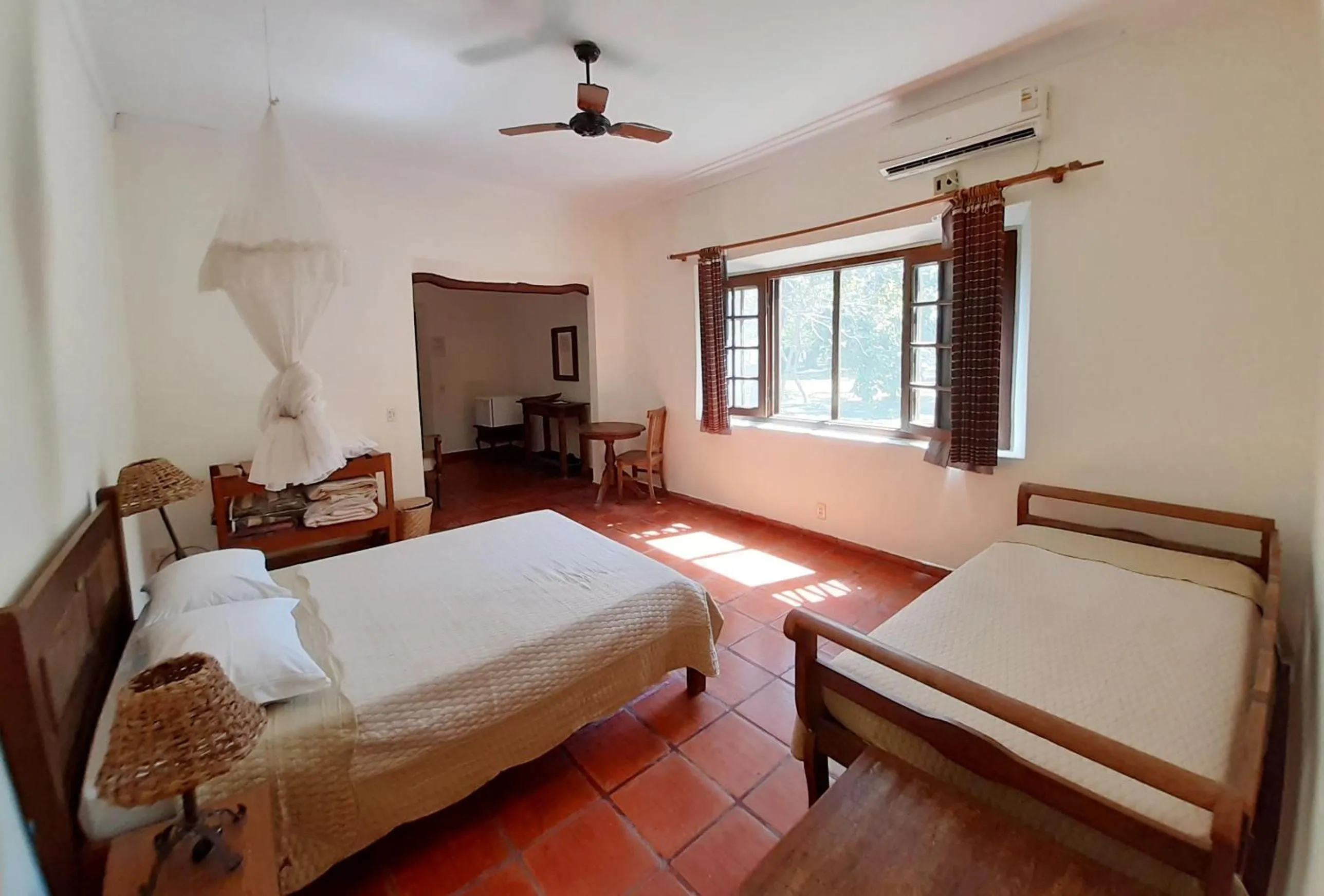 Photo of the whole room, Bed in Pousada Fazenda Xaraés