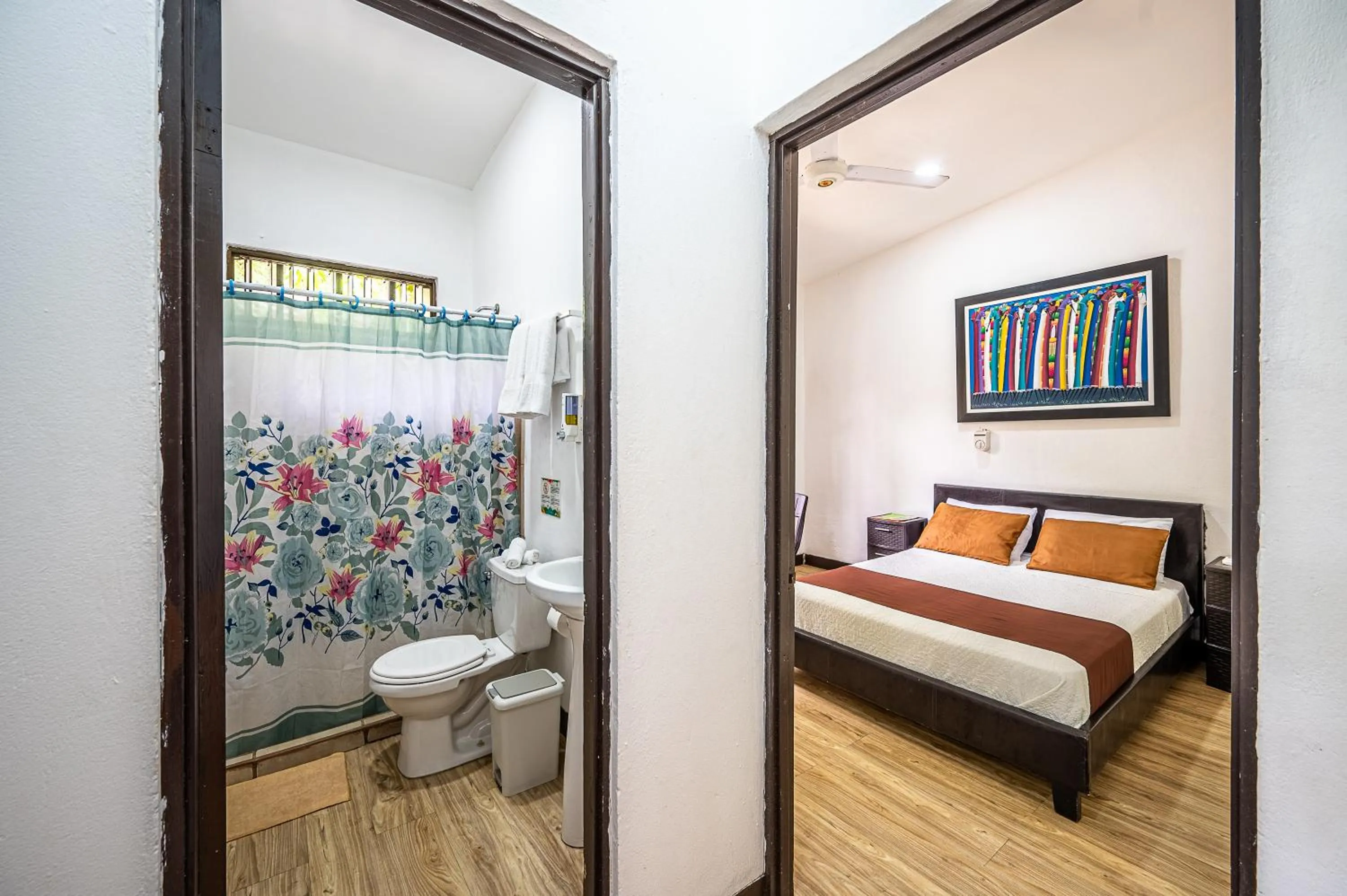 Bed in Jaco Lodge Quiet Place