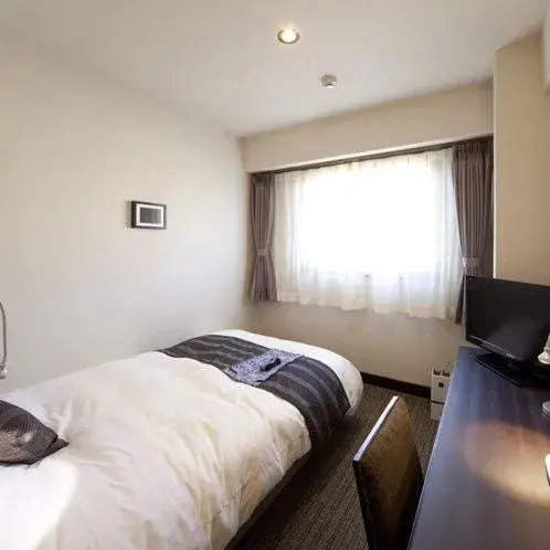 Photo of the whole room, Bed in Silk Inn Kagoshima Photo of the whole room, Bed in Silk Inn Kagoshima