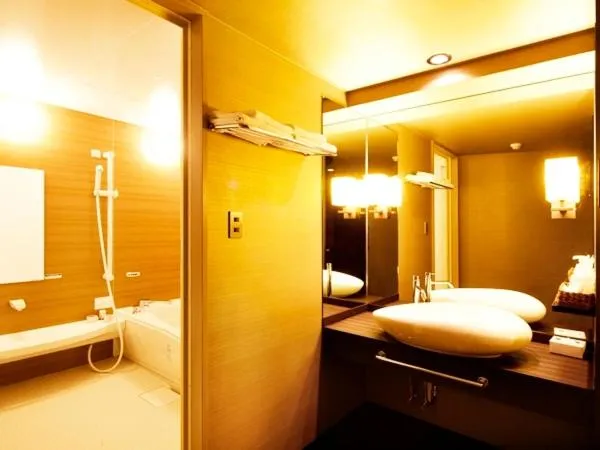 Bed in Silk Inn Kagoshima