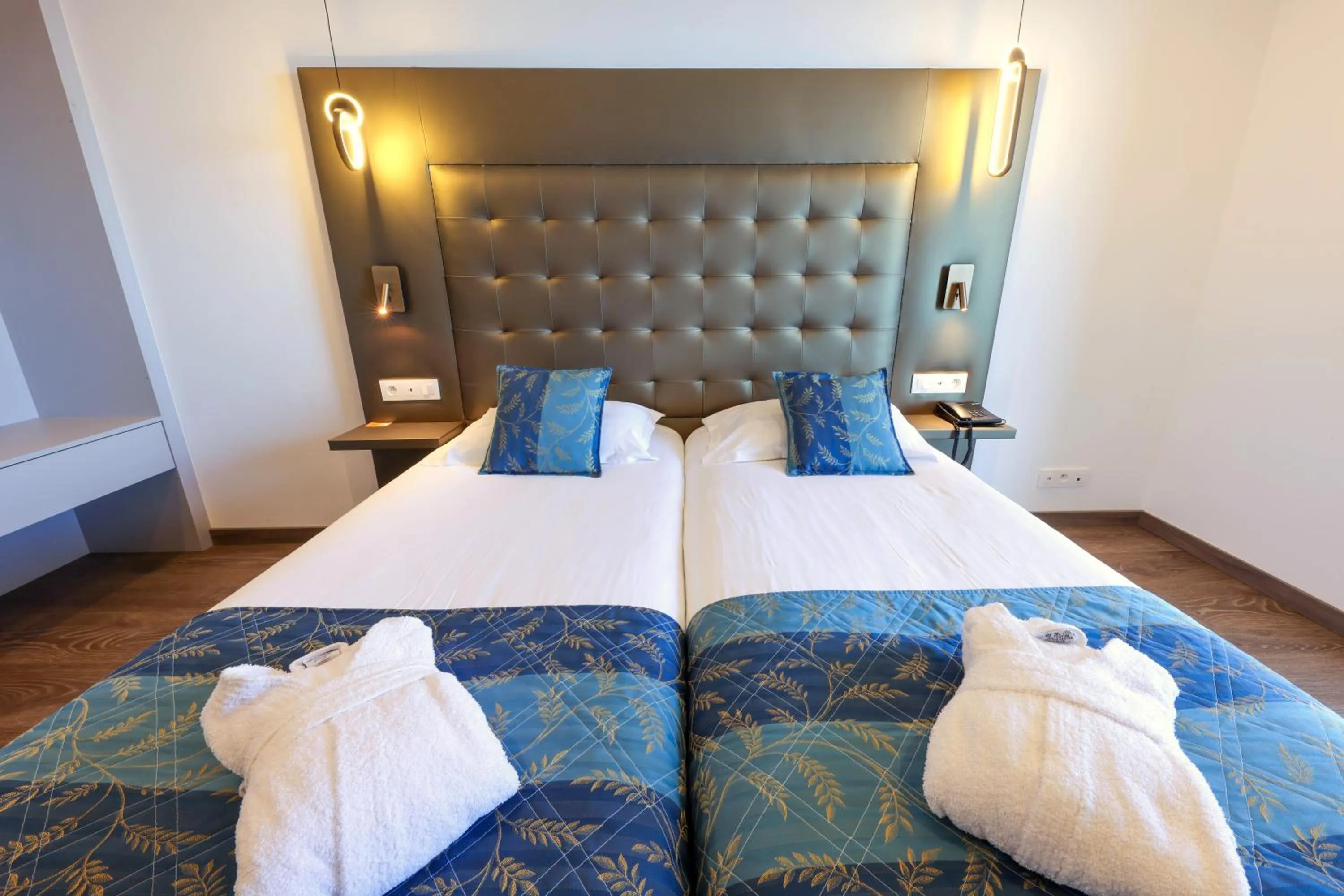 Bed in Hotel Saint Christophe