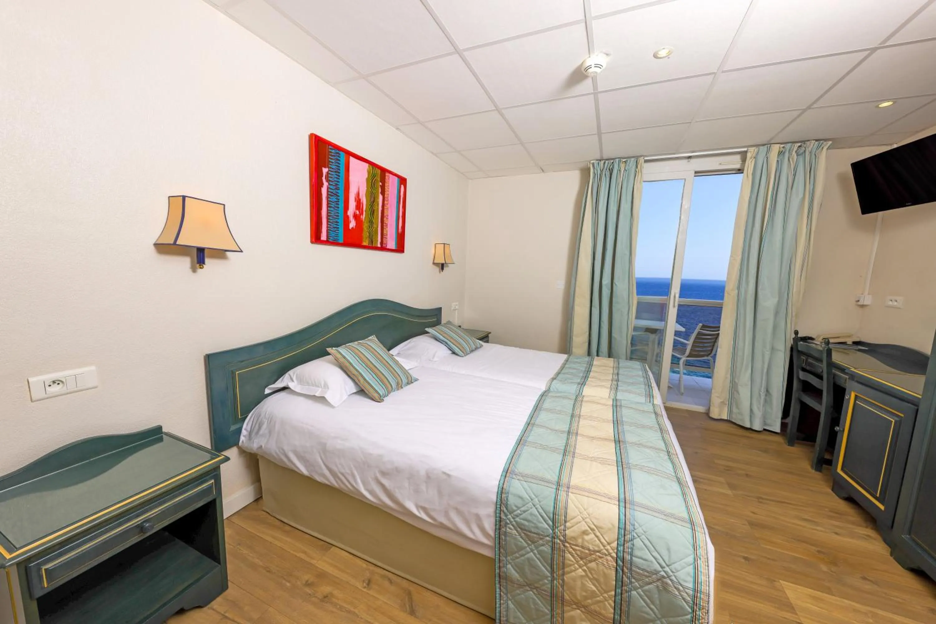 Bed in Hotel Saint Christophe