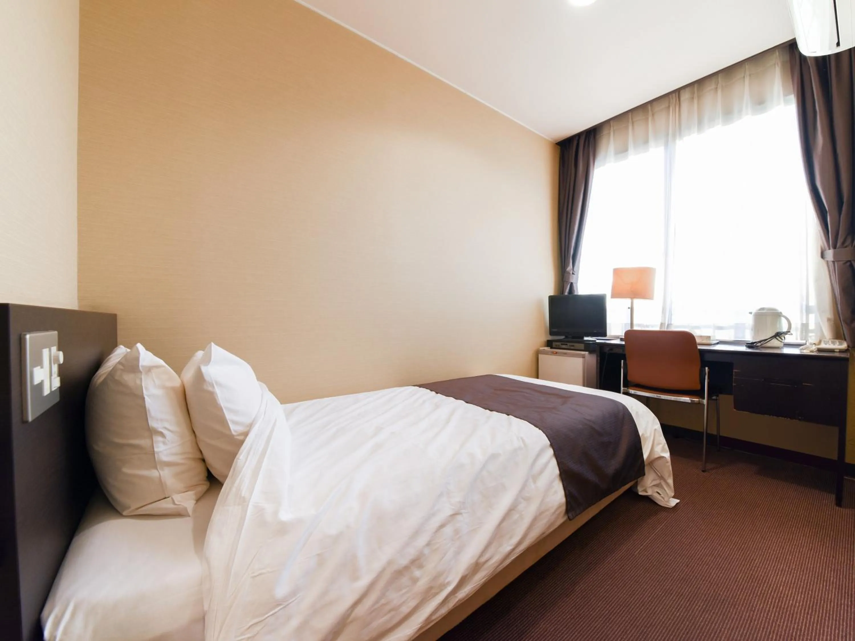 Photo of the whole room, Bed in Tanegashima Araki Hotel