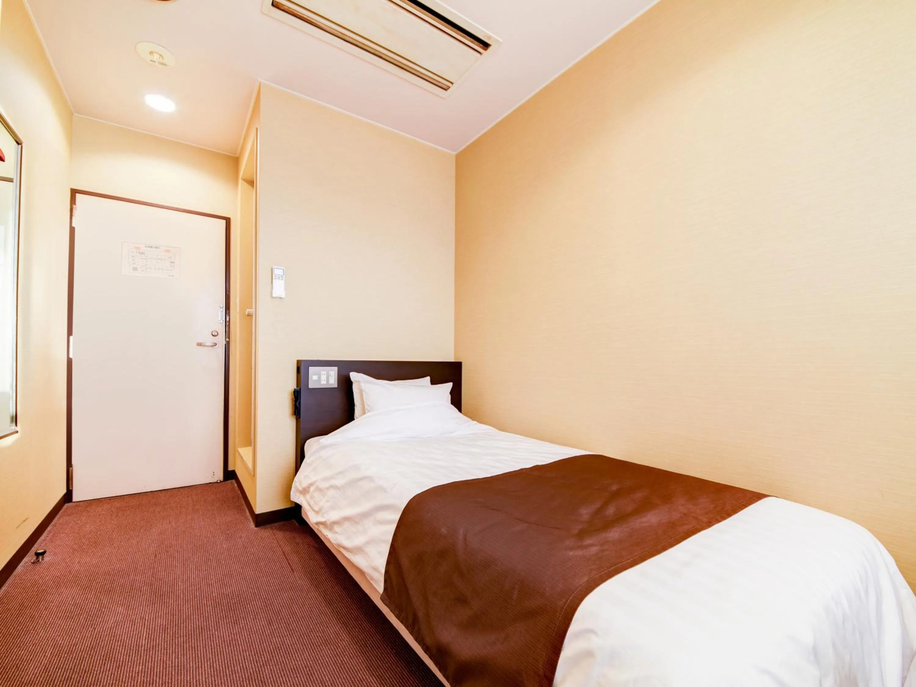 Photo of the whole room, Bed in Tanegashima Araki Hotel