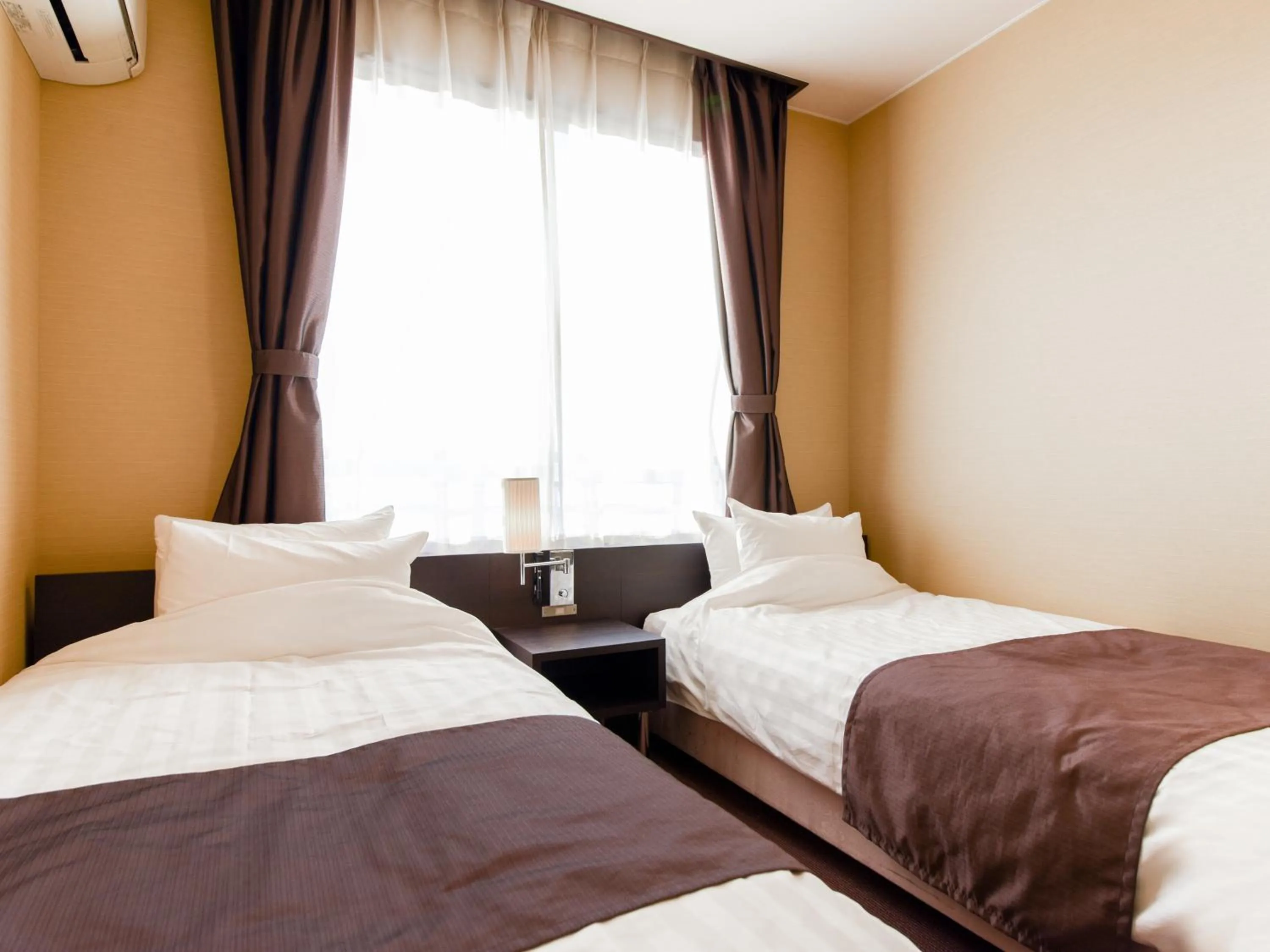 Photo of the whole room, Bed in Tanegashima Araki Hotel