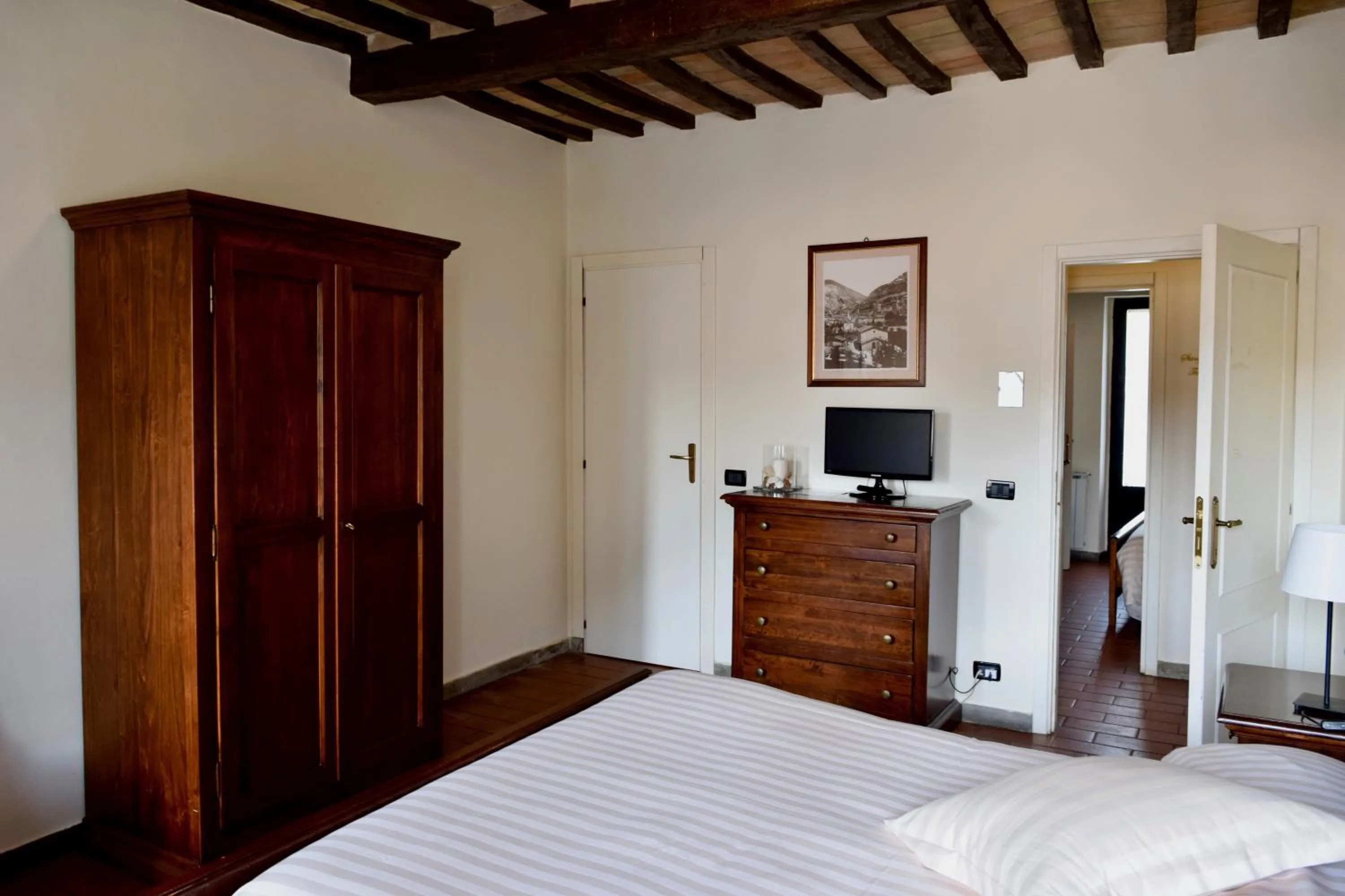 Photo of the whole room, Bed in Residenza Le Logge