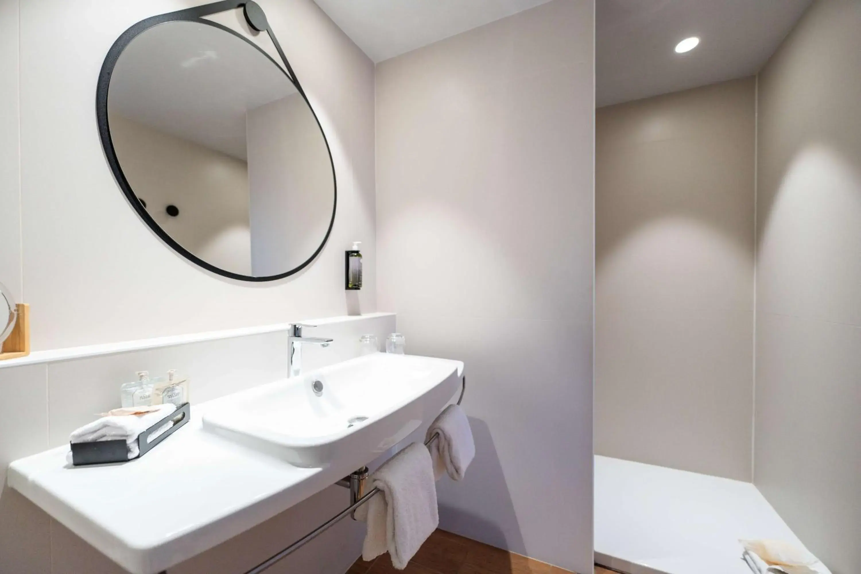 Bathroom in Best Western Premier Le Masq Hotel Bathroom in Best Western Premier Le Masq Hotel