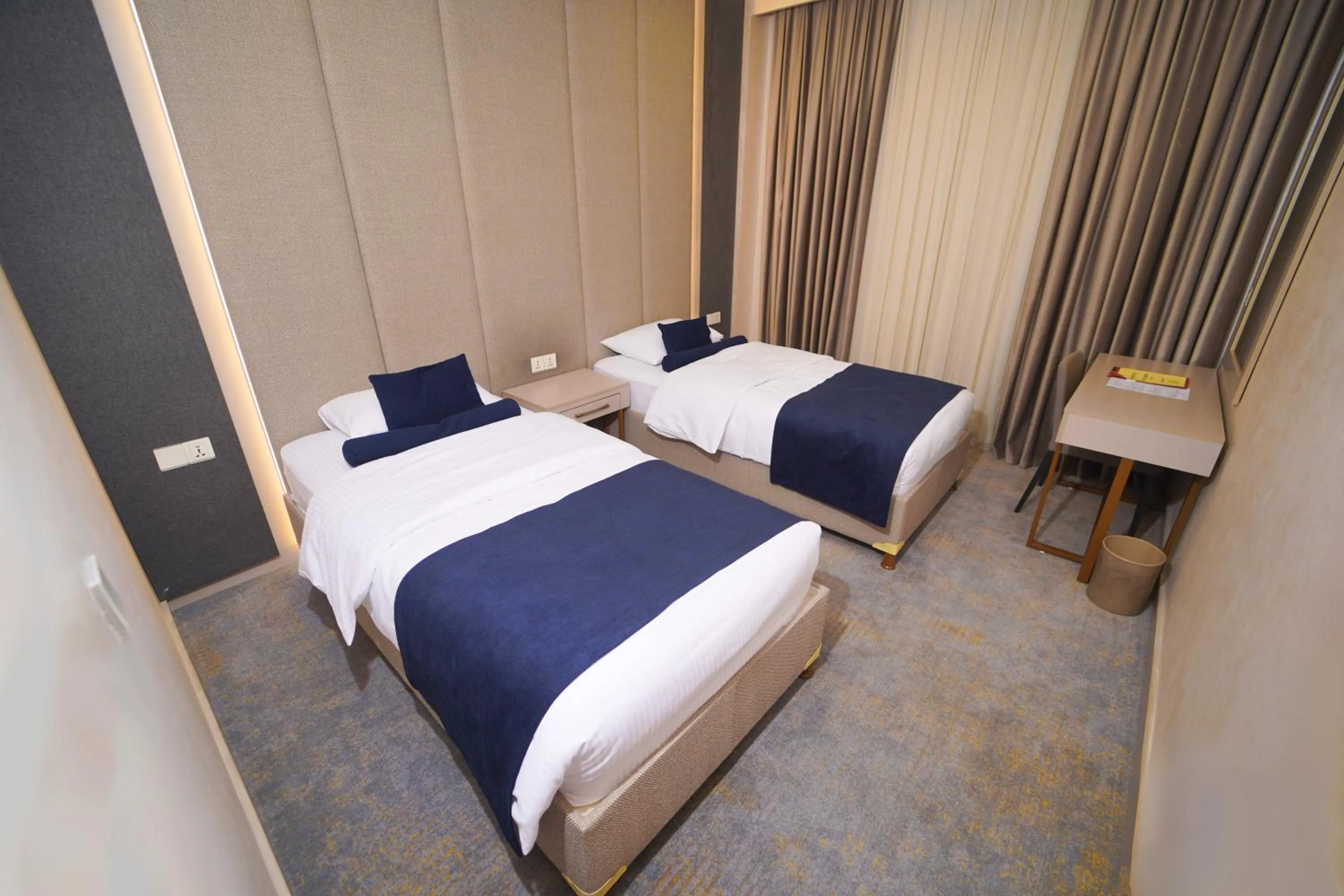 Bed in Darin Plaza Hotel