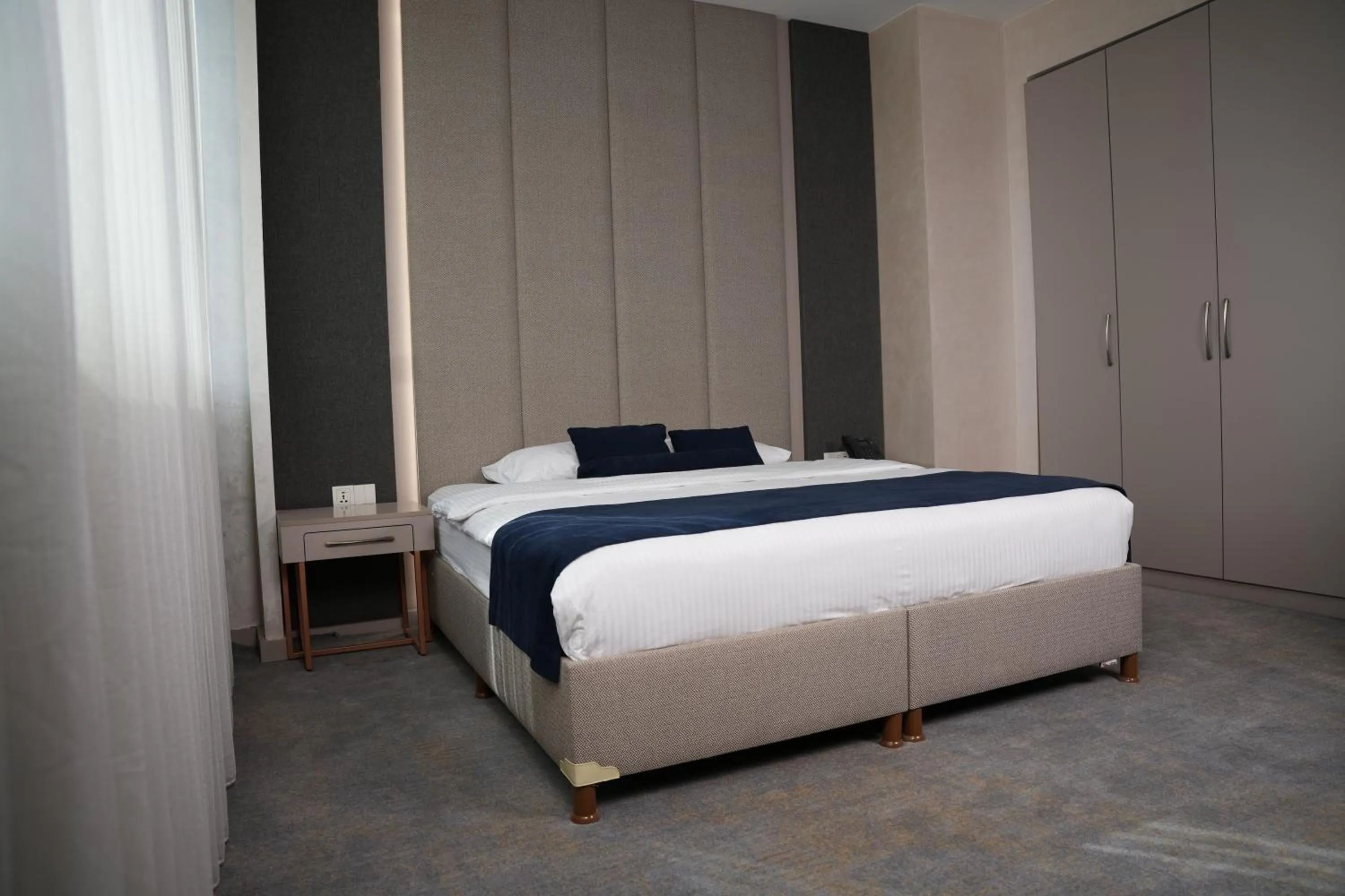 Bed in Darin Plaza Hotel