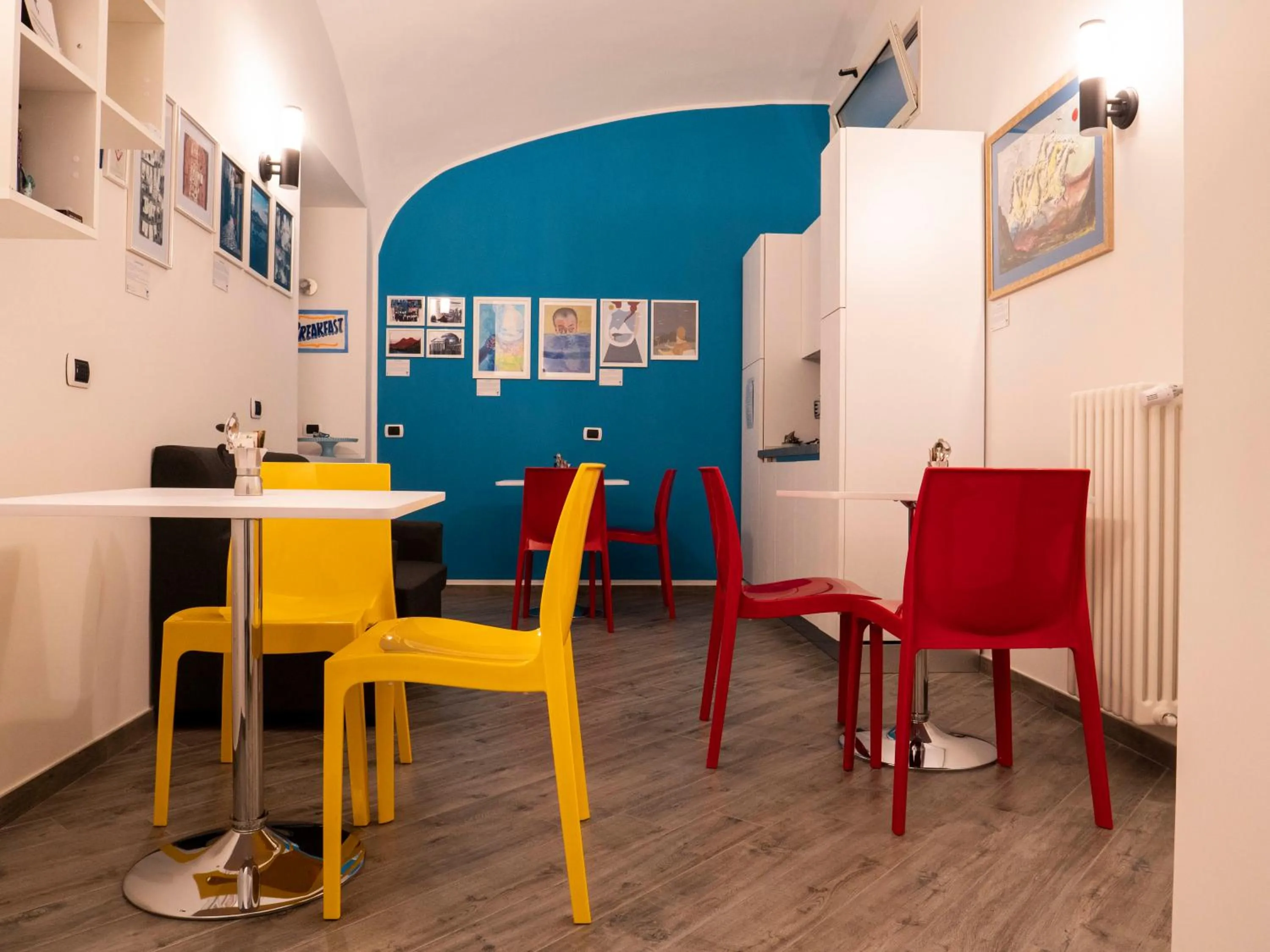 Communal lounge/ TV room in B&B Cosmoneapolitan