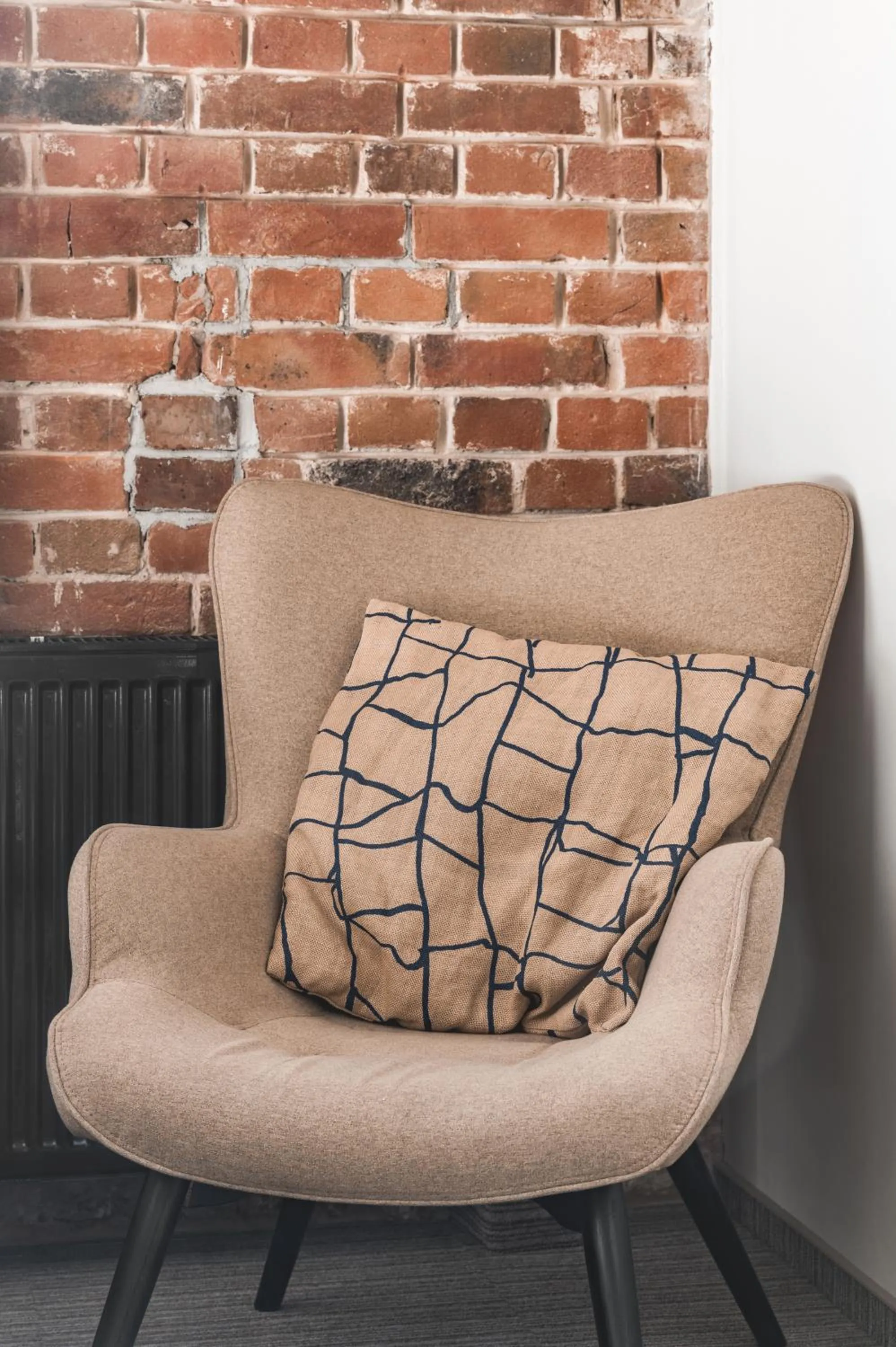 Seating area in Aparthotel Stara Przędzalnia