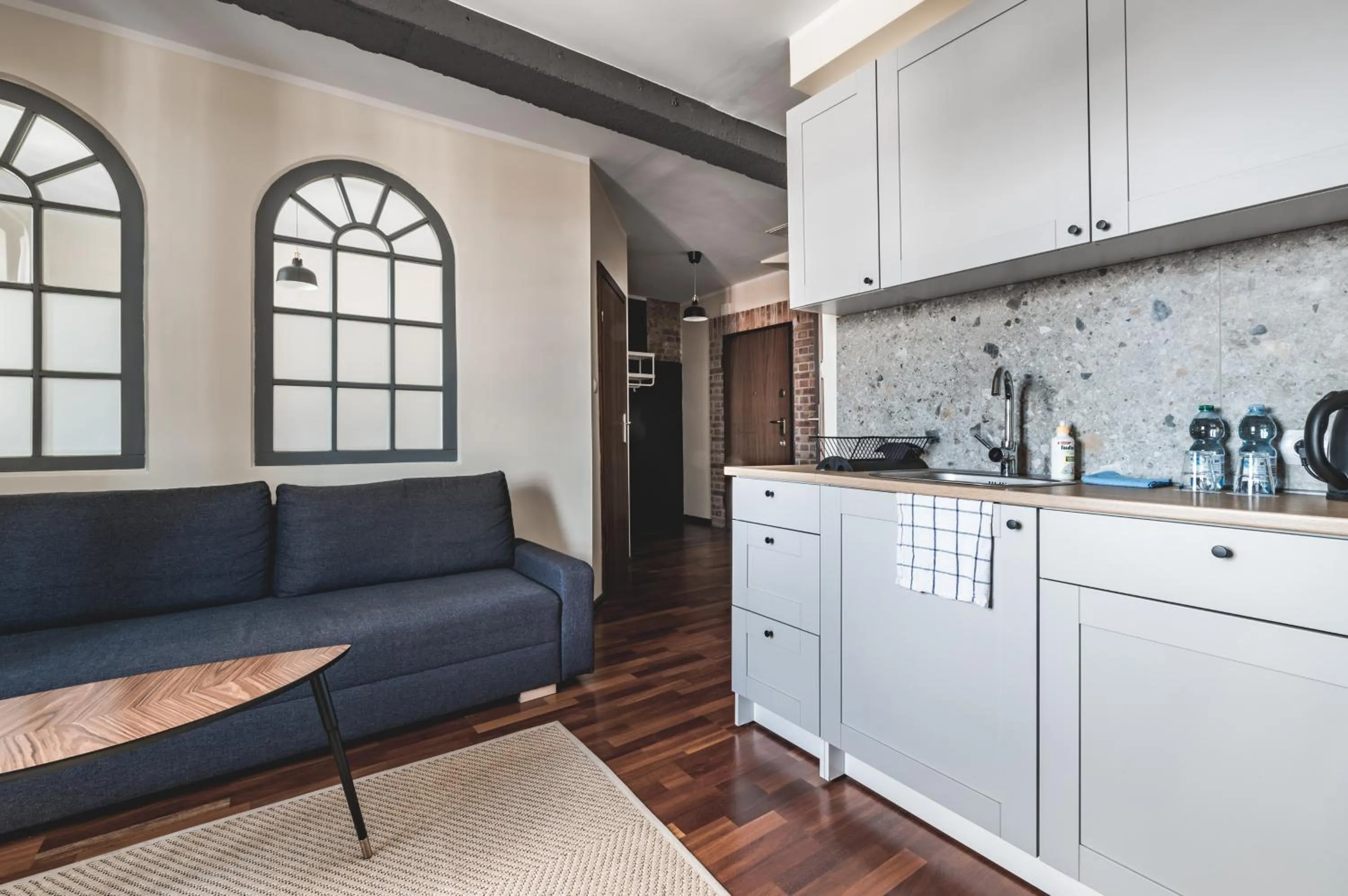 Kitchen or kitchenette in Aparthotel Stara Przędzalnia