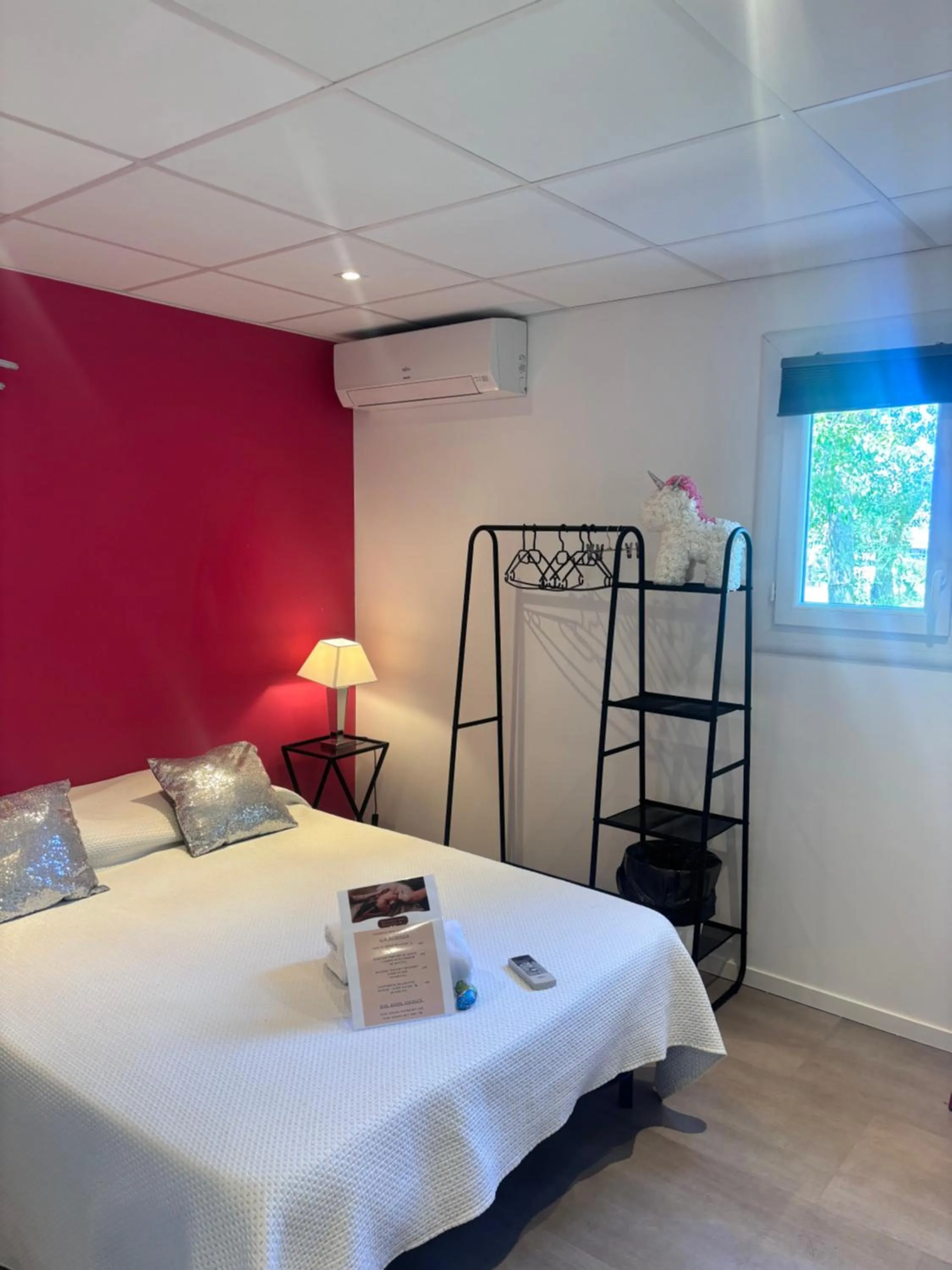 Bed in Le Grand Large Bord de Mer Hotel & Appartements