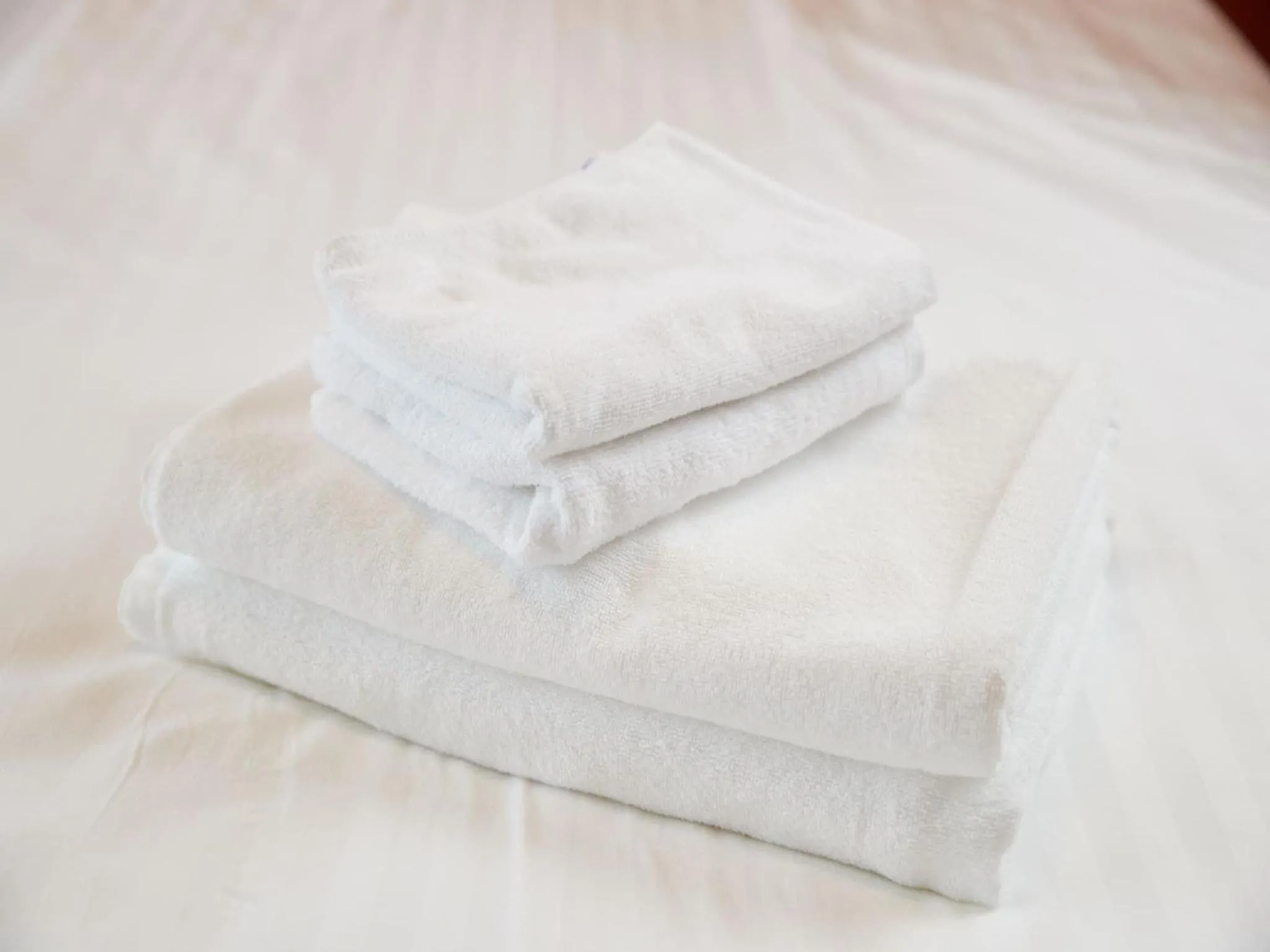 towels, Bed in Hotel Cuore Kokusai Dori Naha