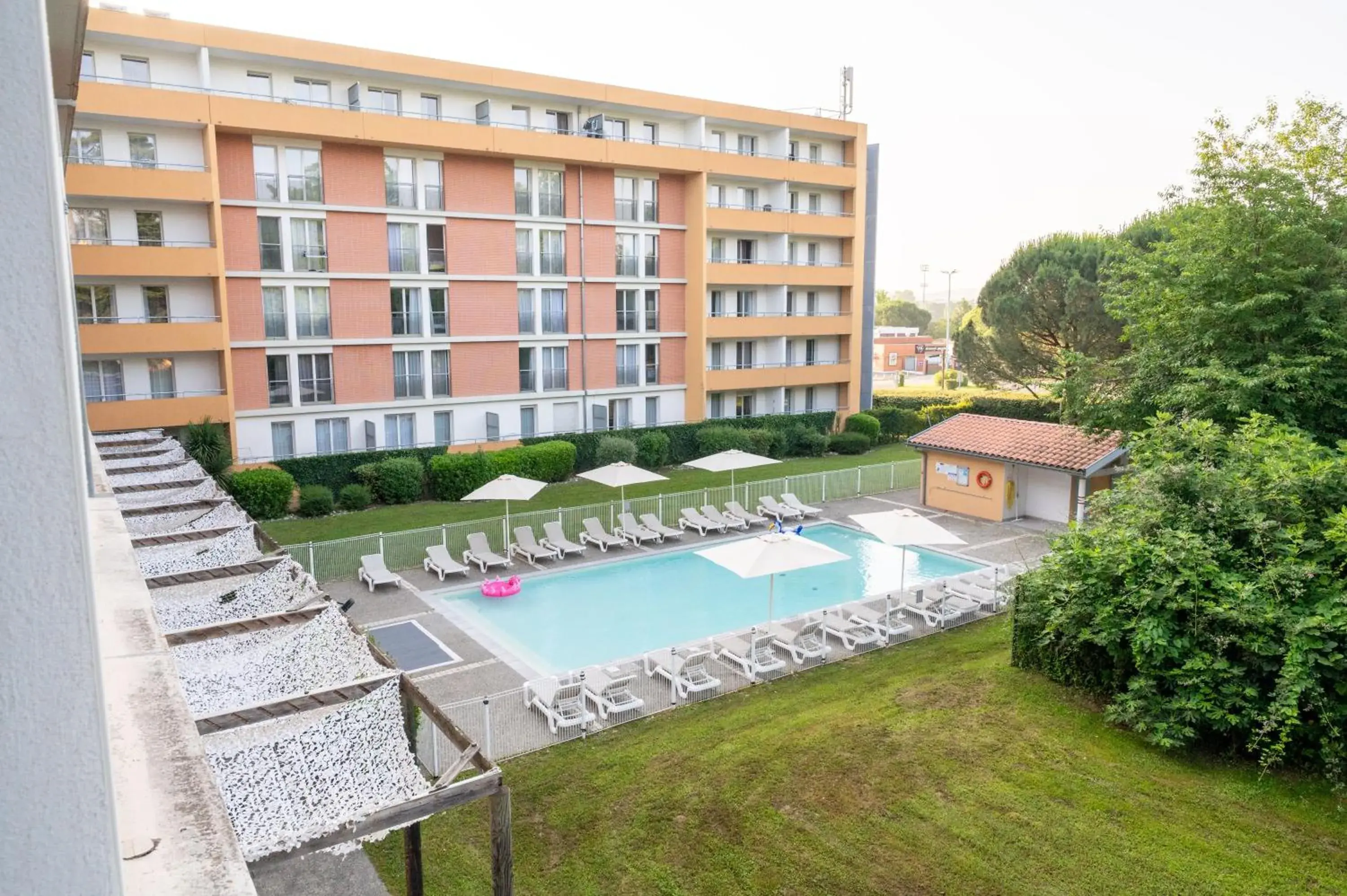 Garden view in Comfort Aparthotel Toulouse Métropole Garden view in Comfort Aparthotel Toulouse Métropole