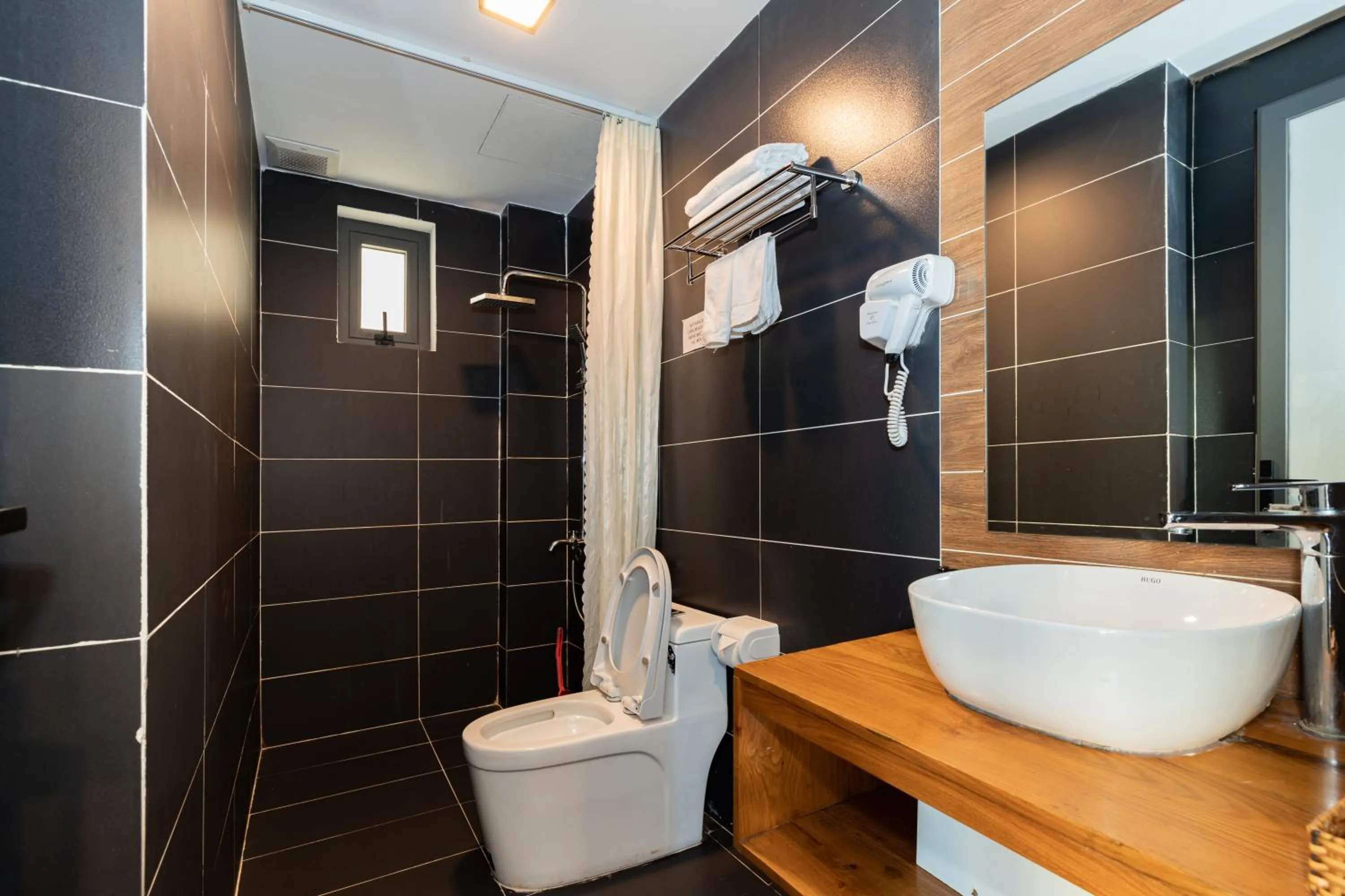 Bathroom in Smeraldo Hotel & Apartment