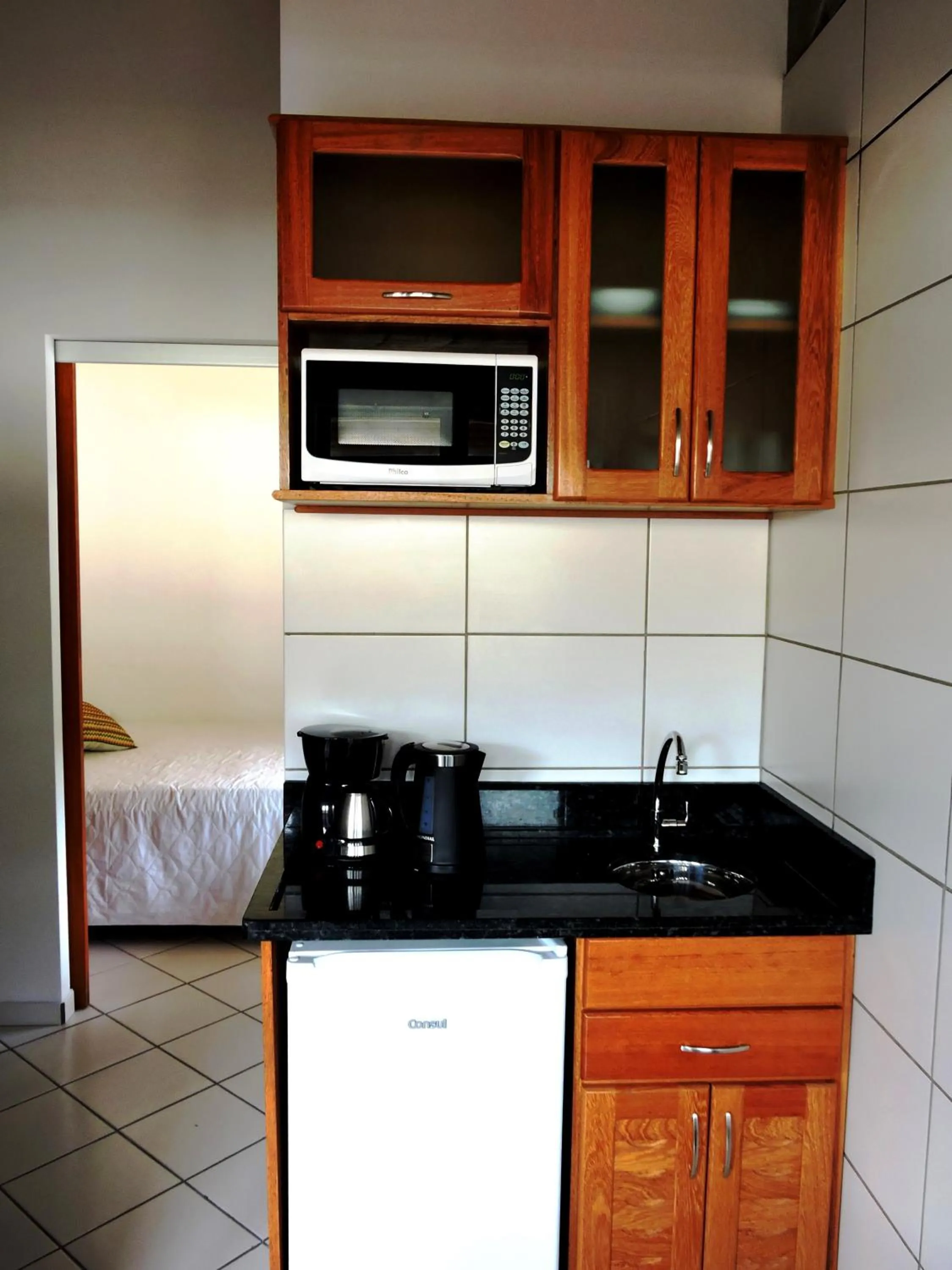 Kitchen or kitchenette in Pousada Pedra Rosa
