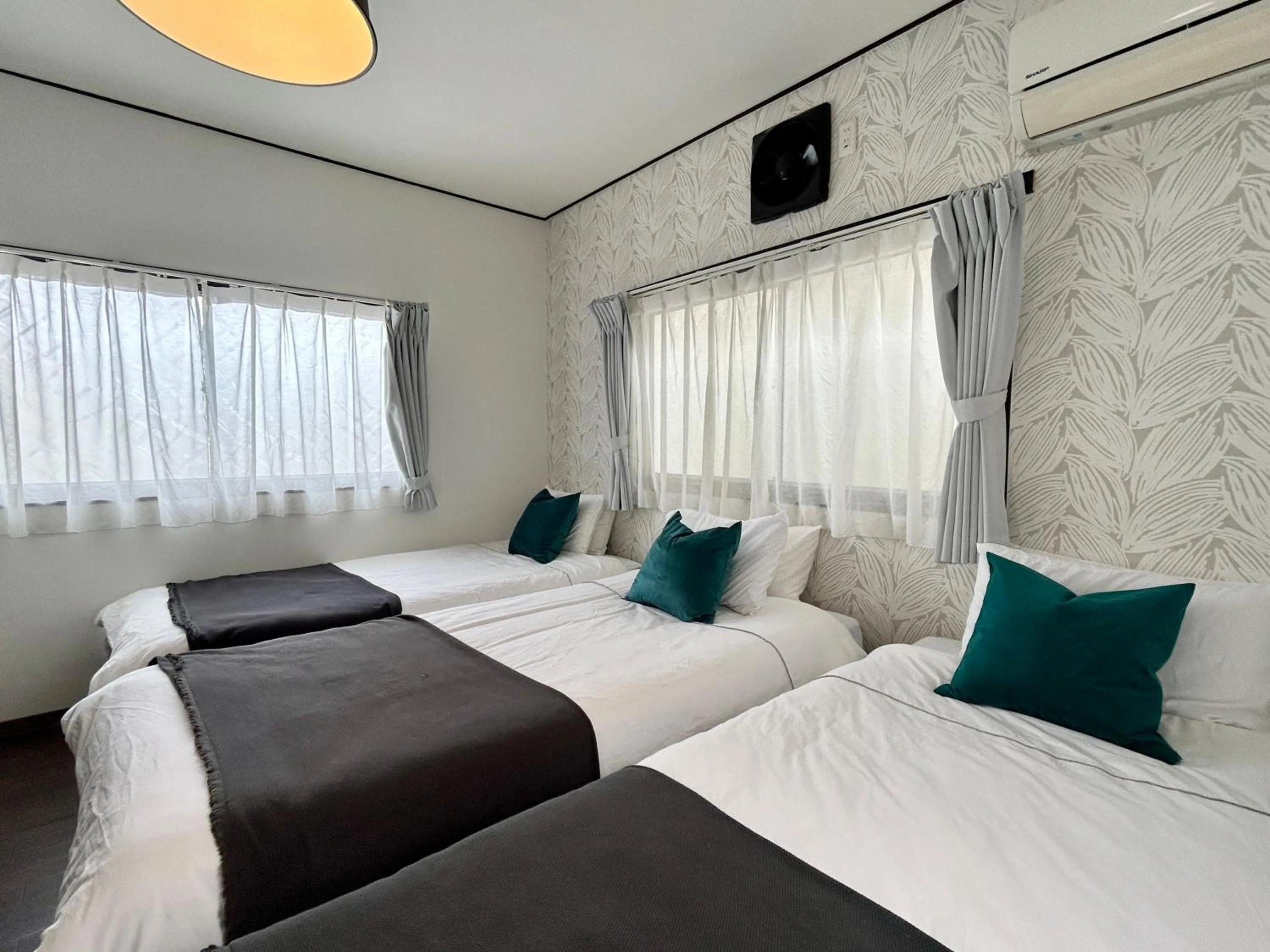 Bedroom, Bed in MON Kishinosato-tamade Ekimae -vacation rental-