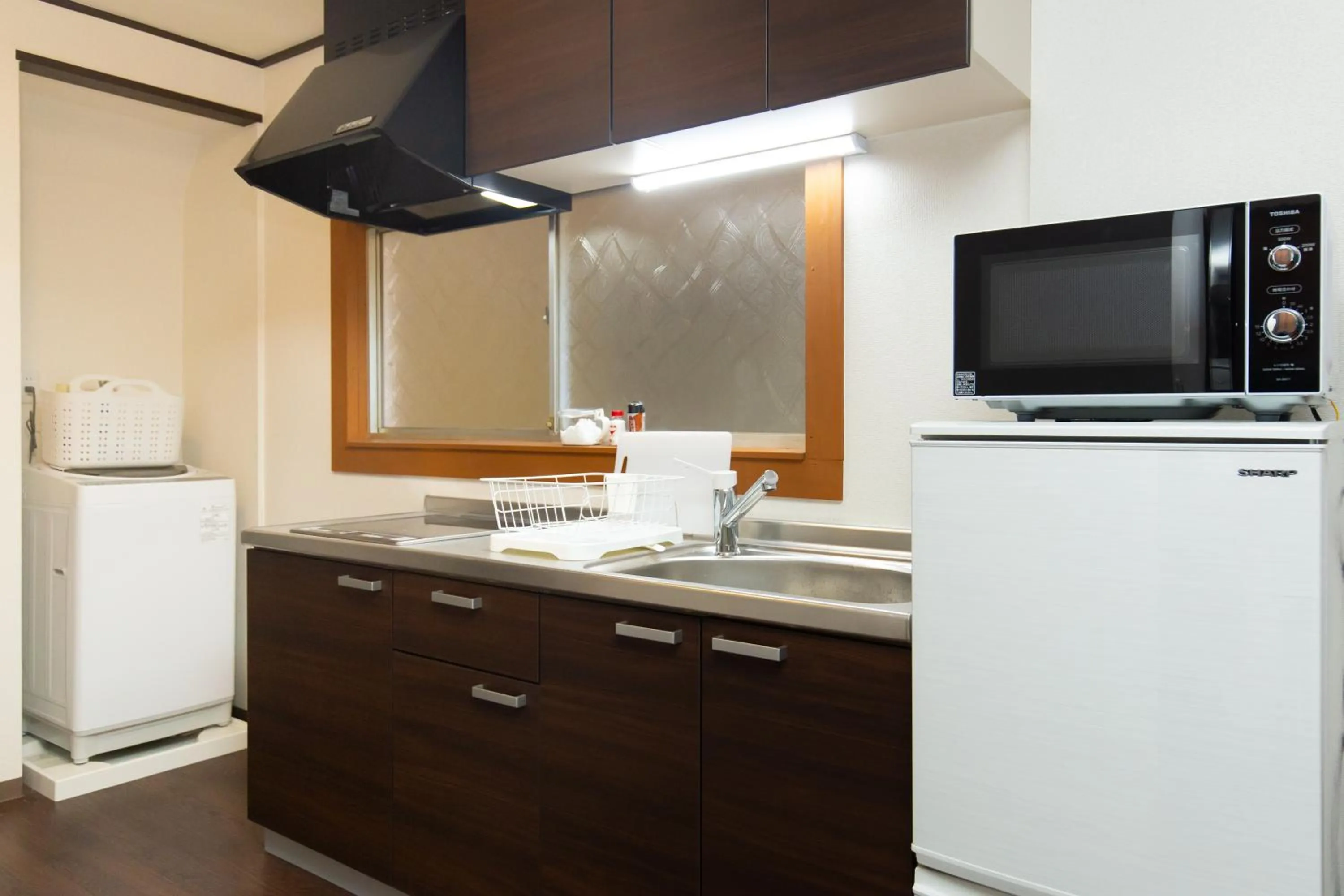 Kitchen or kitchenette in MON Kishinosato-tamade Ekimae -vacation rental-