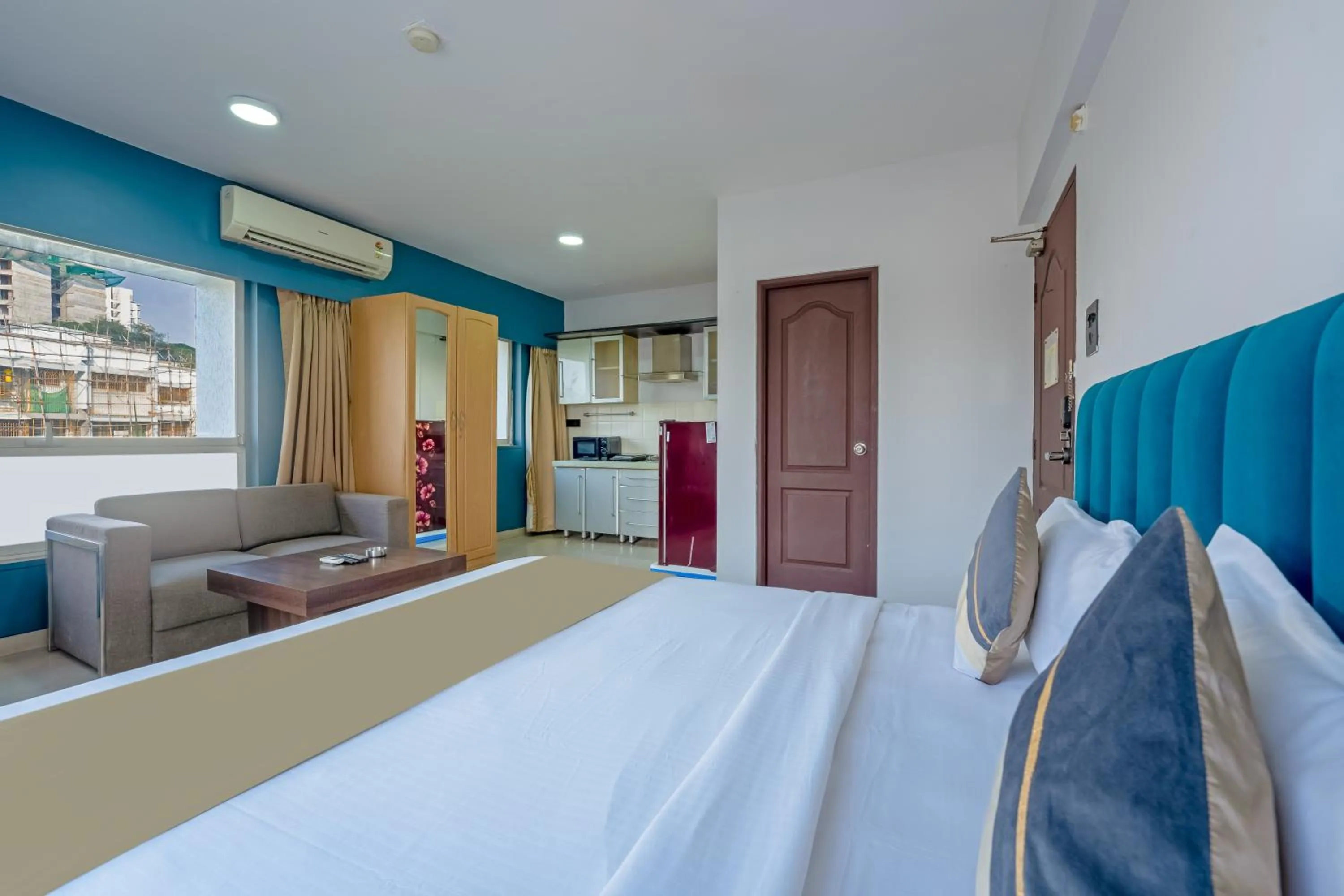 TV and multimedia, Bed in asar Landmark Suites Mumbai International Airport by Orion Hotels