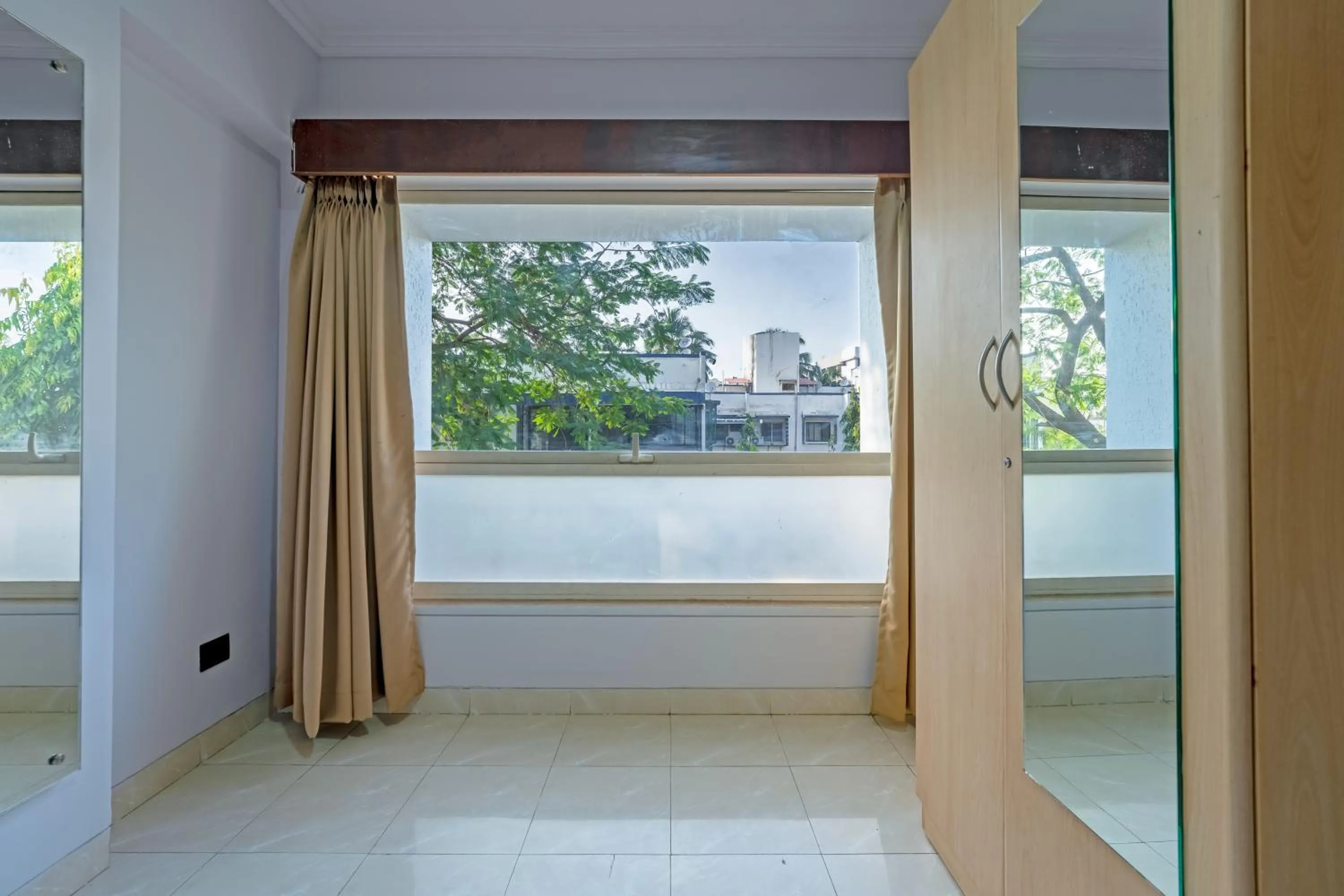 Bedroom in asar Landmark Suites Mumbai International Airport by Orion Hotels
