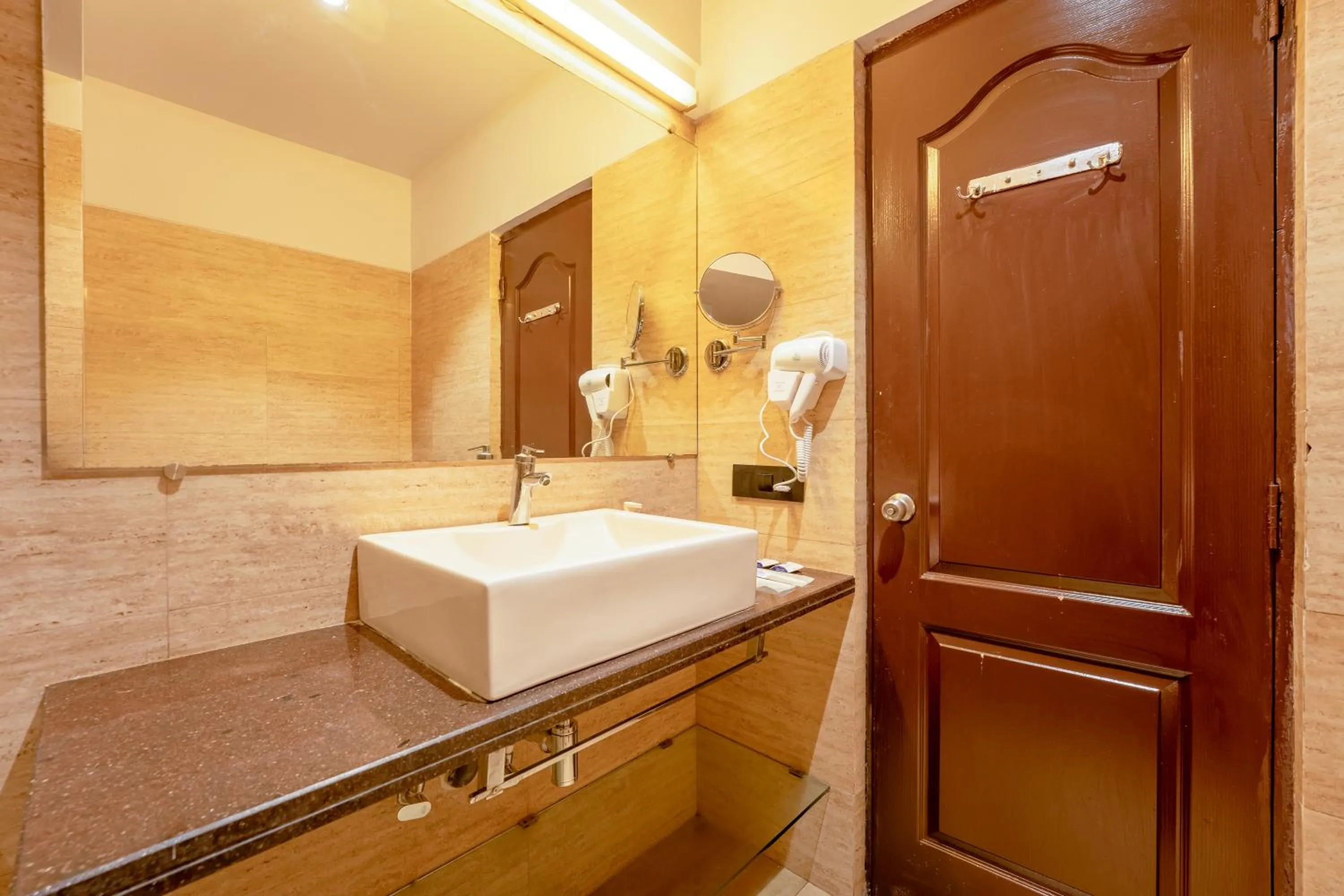 Shower in asar Landmark Suites Mumbai International Airport by Orion Hotels