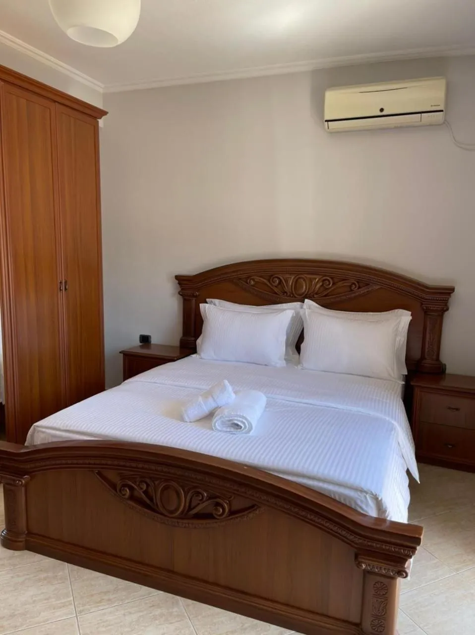 Bed in Brilant Luxury Apartment