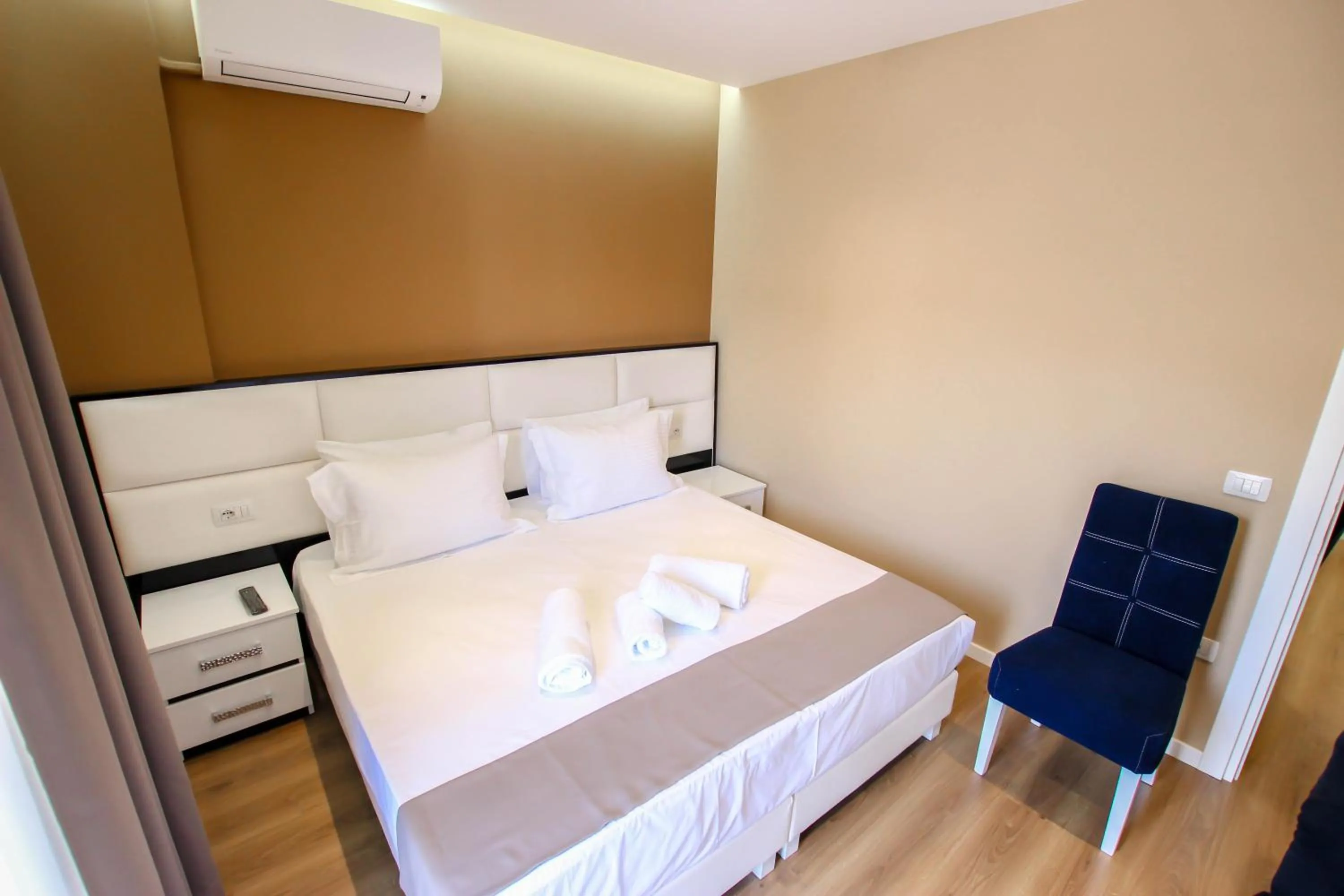 Bed in Brilant Luxury Apartment