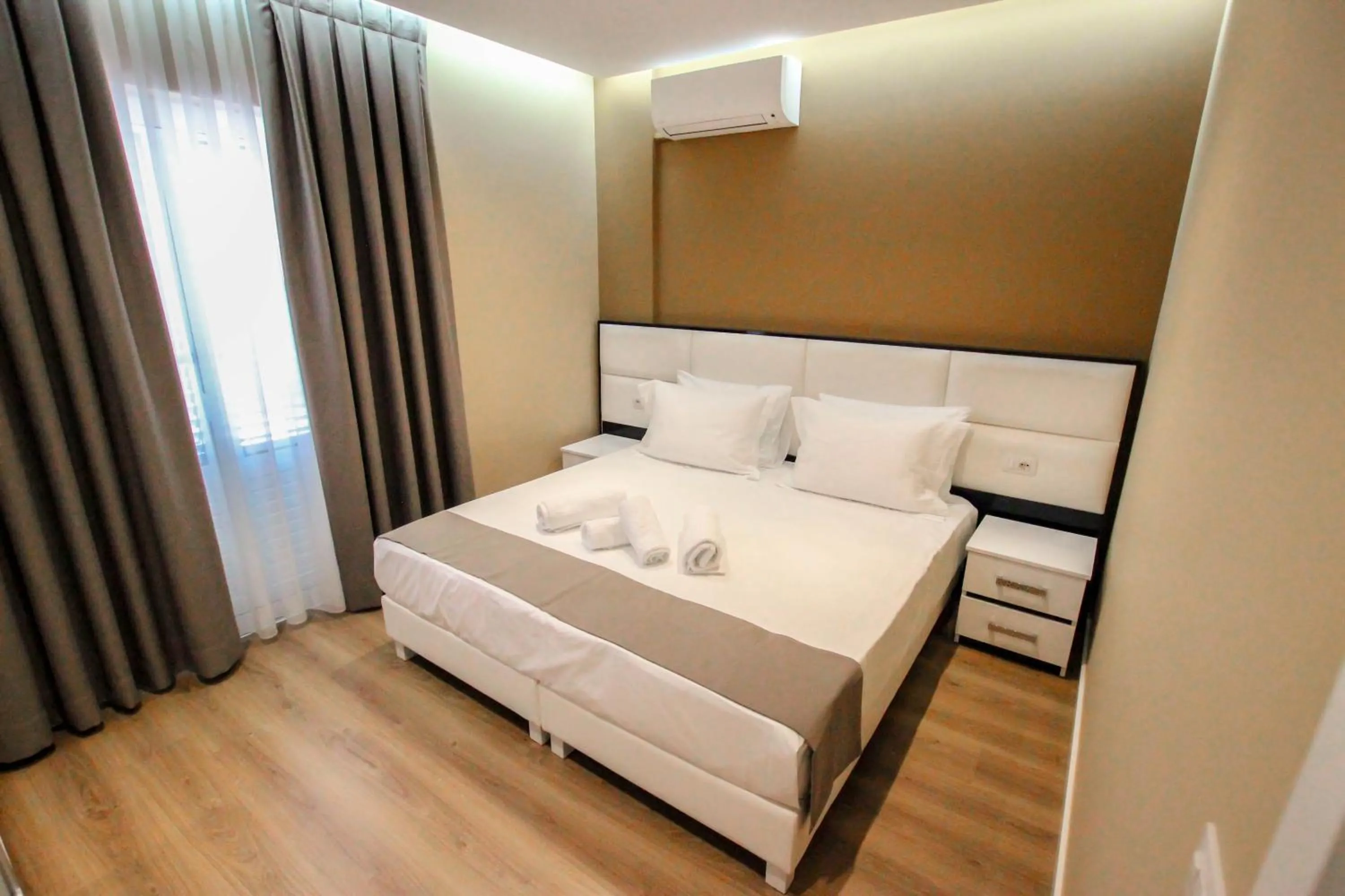 Bed in Brilant Luxury Apartment